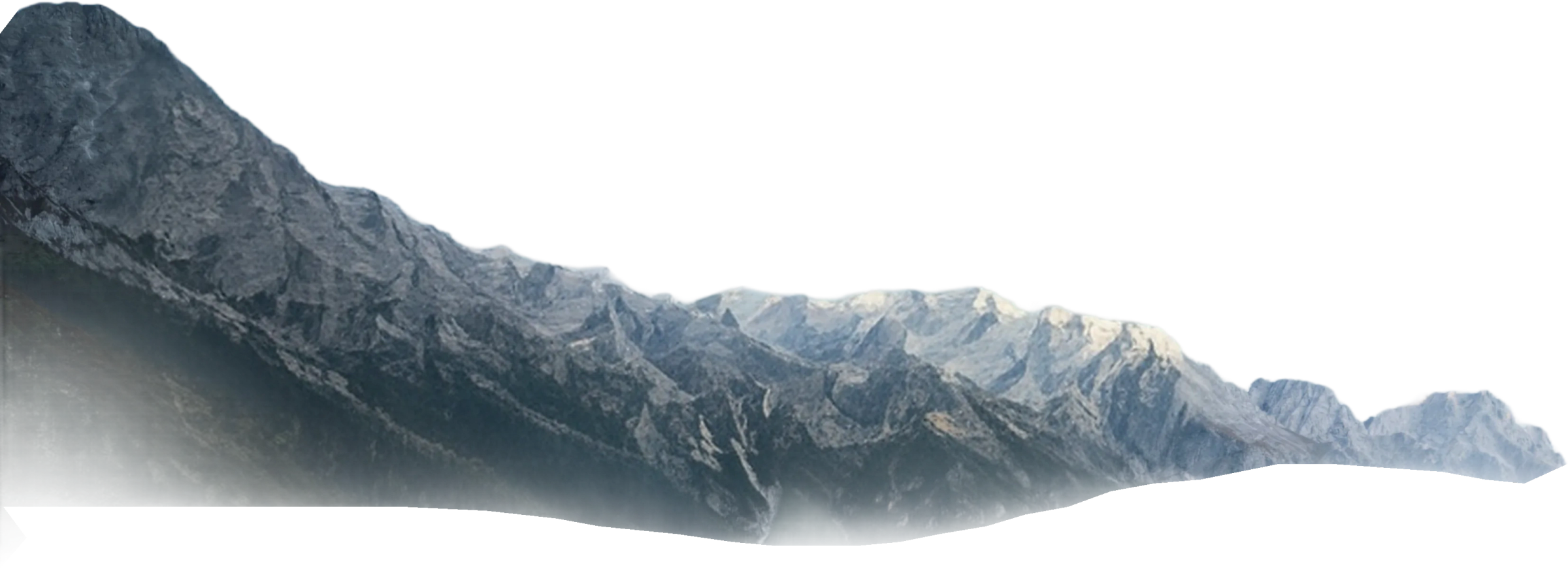 Snow-capped mountain ridge at dusk