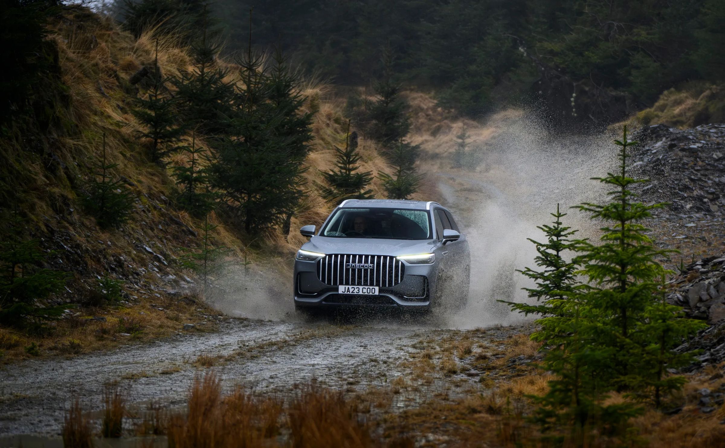 JAECOO 7 on a muddy forest track