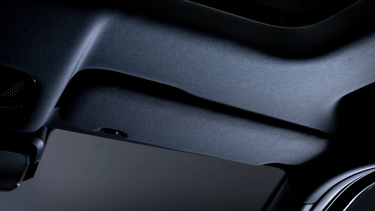 Black suede-style headliner and sun visor