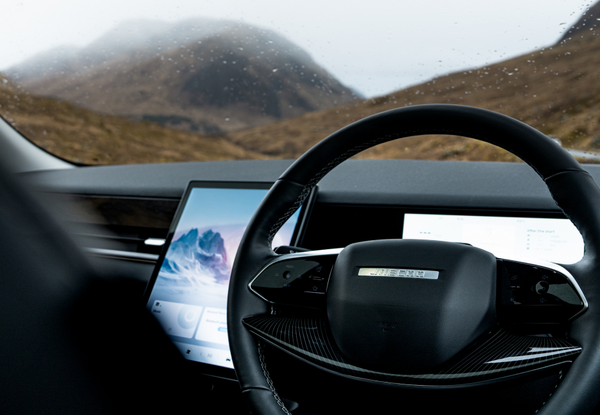 JAECOO steering wheel and driver display with the Highlands beyond