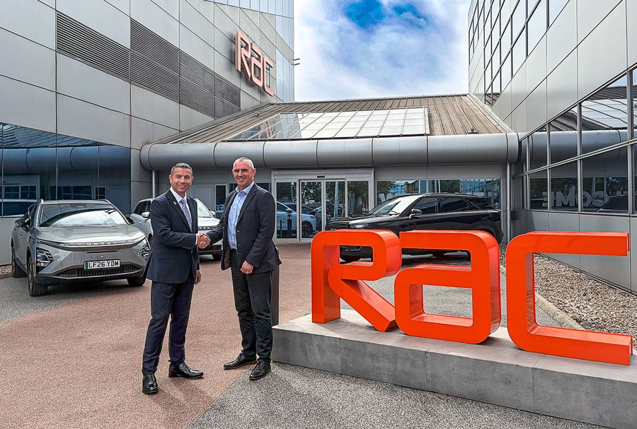 OMODA&JAECOO and RAC representatives shaking hands outside the RAC headquarters in Walsall