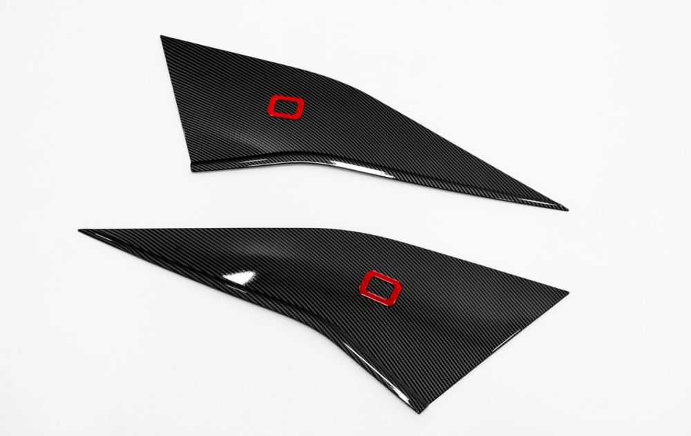 OMODA E5 styling kit — C-pillar trims with OMODA badge