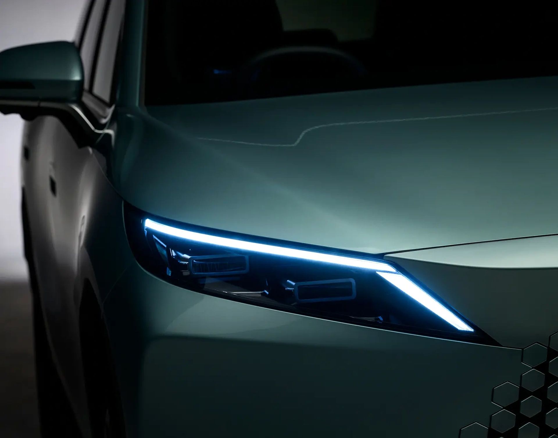 Close-up of an OMODA headlight