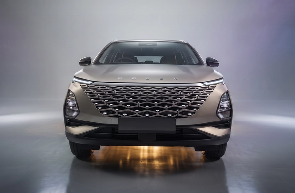 OMODA SUV being driven on an open road