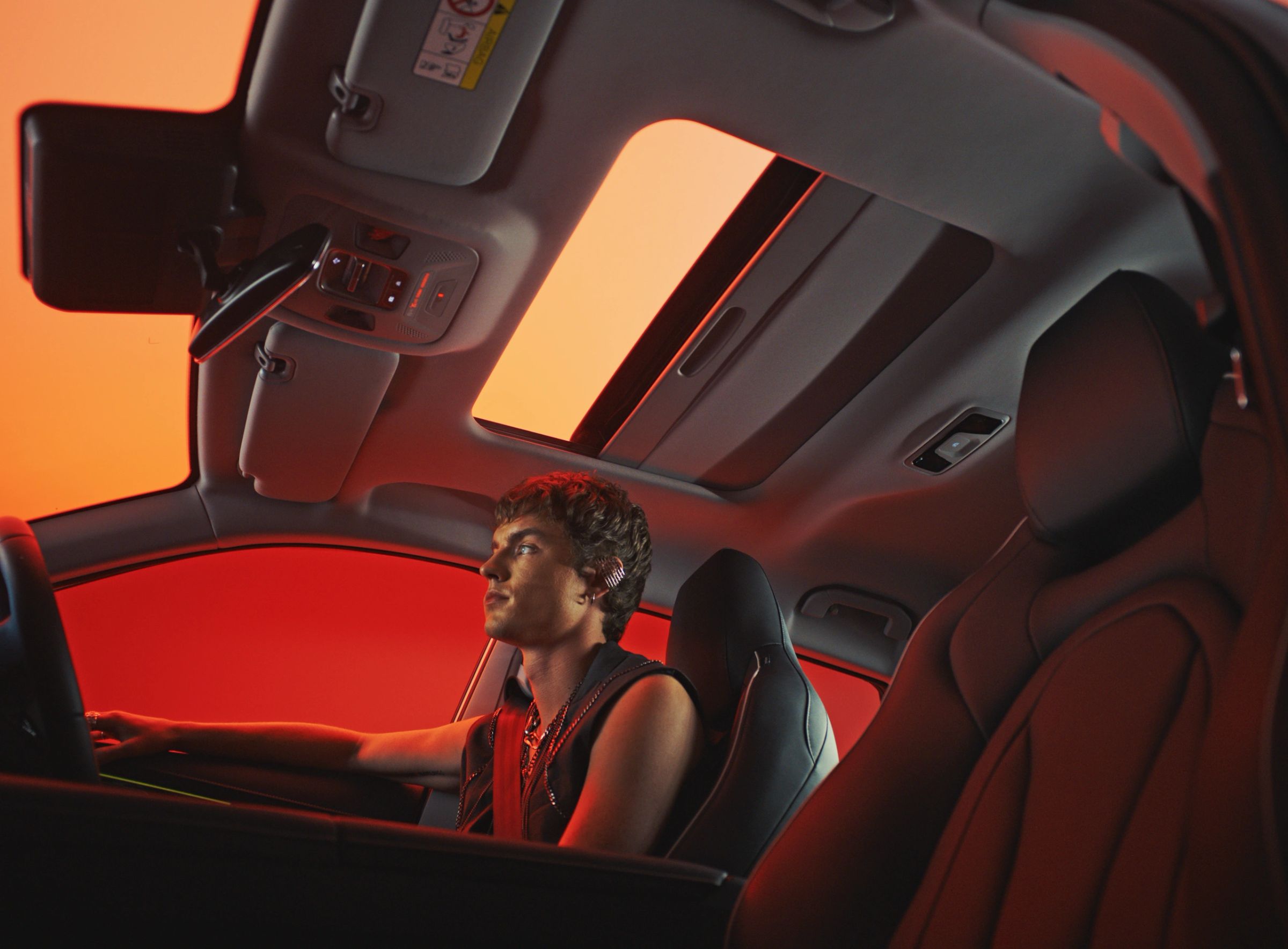OMODA interior with a driver