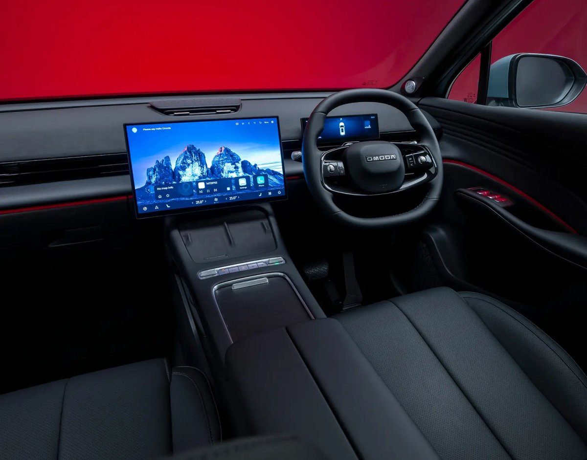 OMODA interior with dashboard, infotainment screen and steering wheel