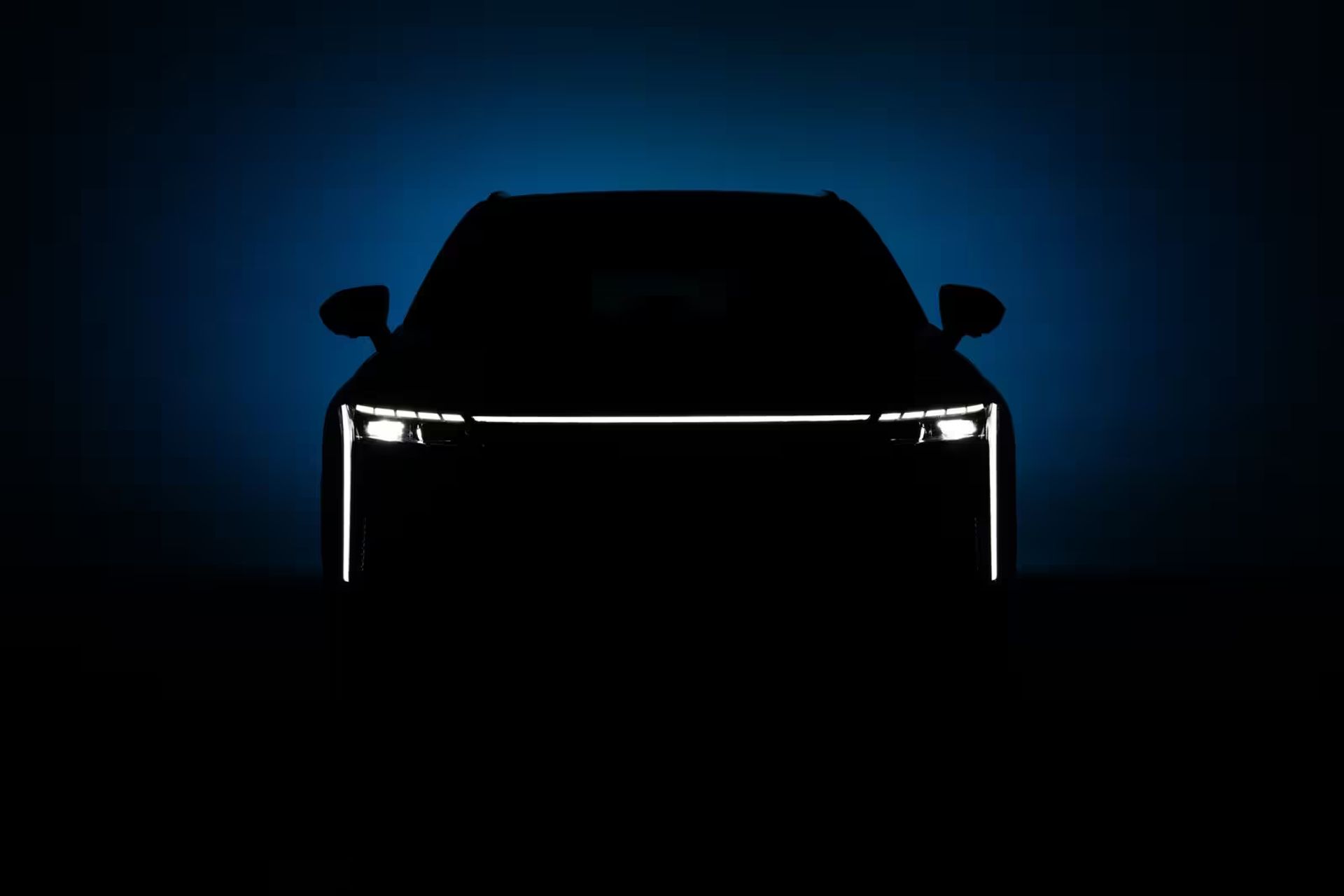 OMODA 9 Black Edition parked at dusk