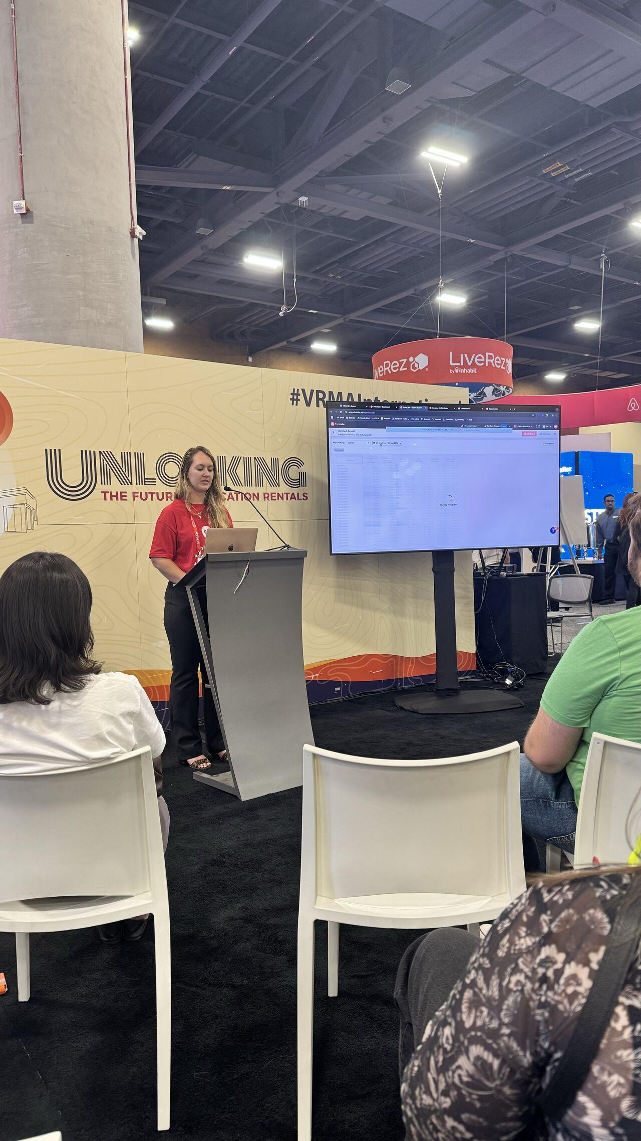 Becca Madigan, Solutions Consultant Manager, highlighting the recently launched Report Builder by PriceLabs