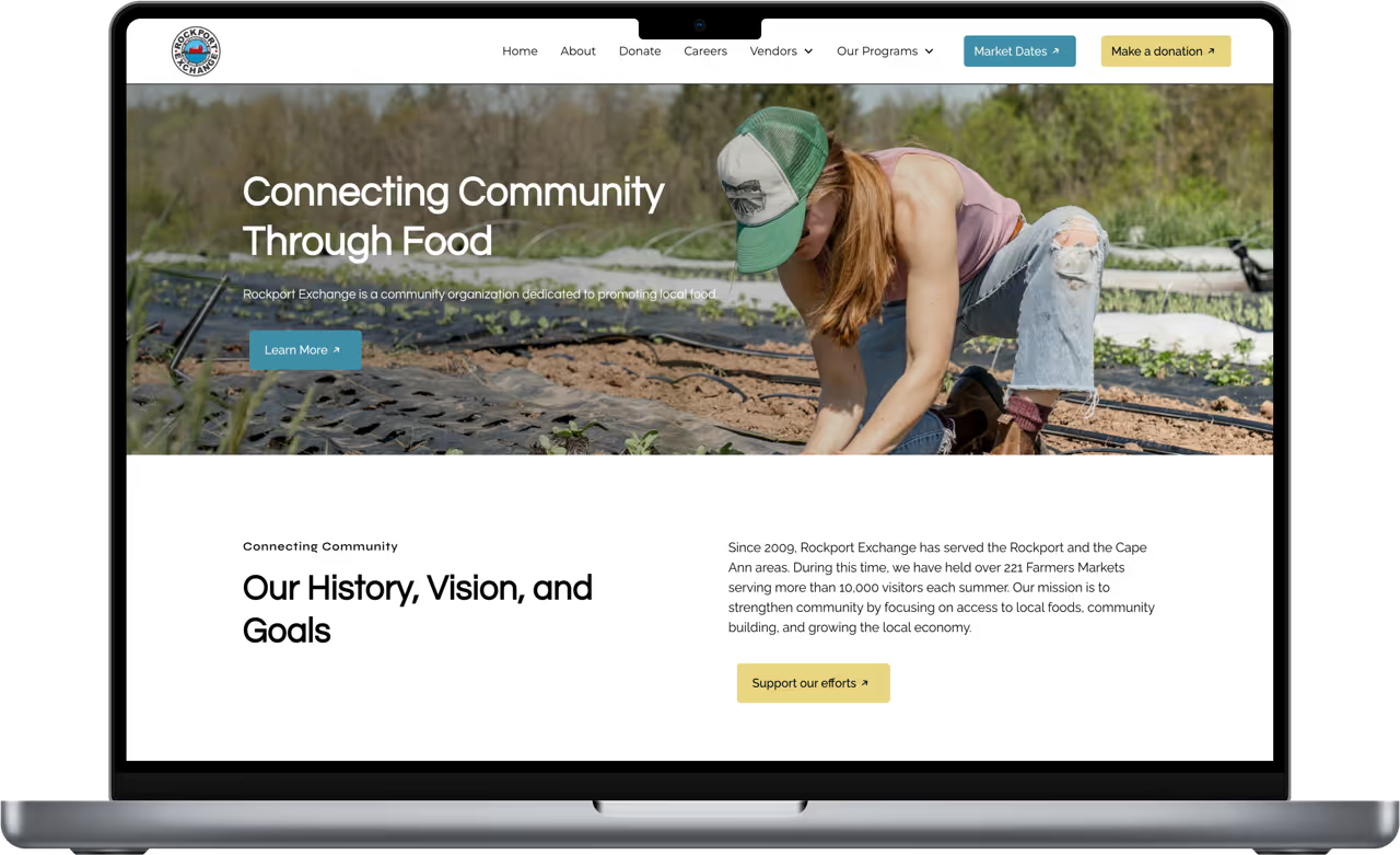 A community event set up outdoors with vendor tables and visitors browsing