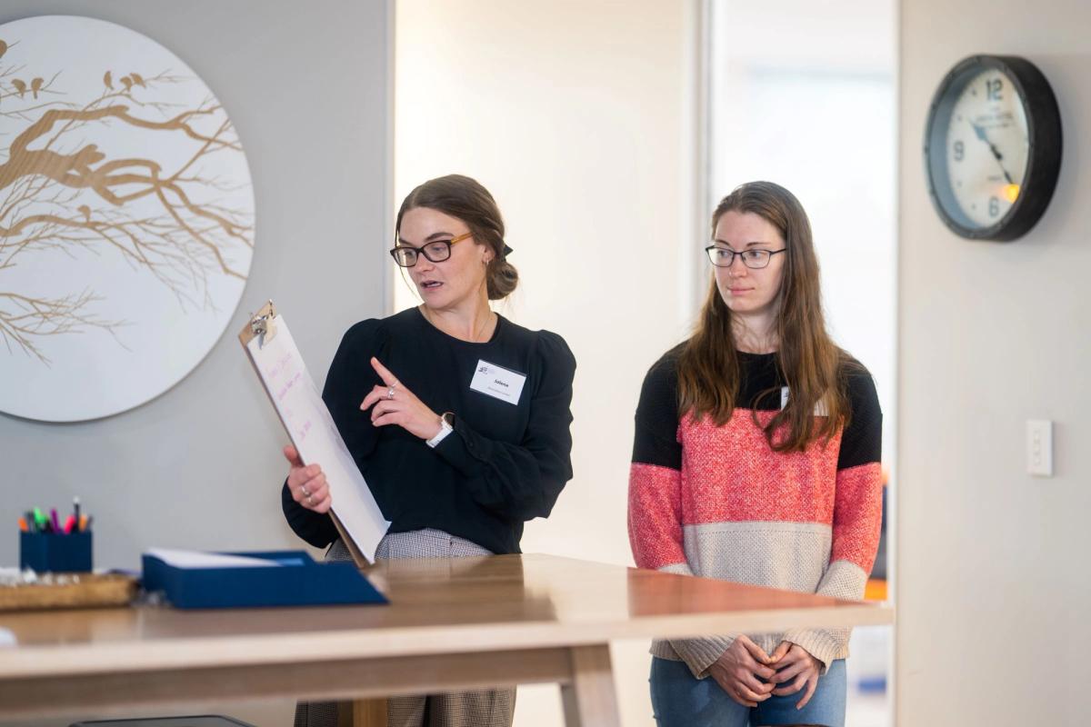 A group of people attending an NZIM course.