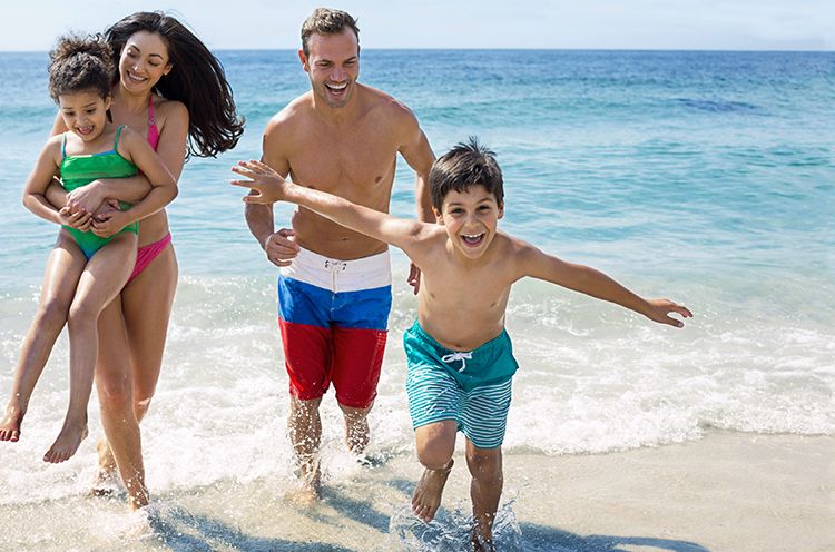 A Group Of People On A Beach