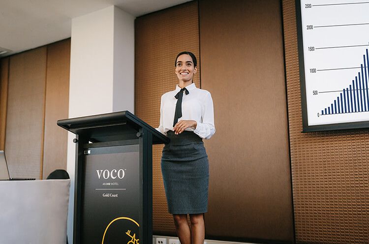 A Person Standing In Front Of A Mirror Posing For The Camera