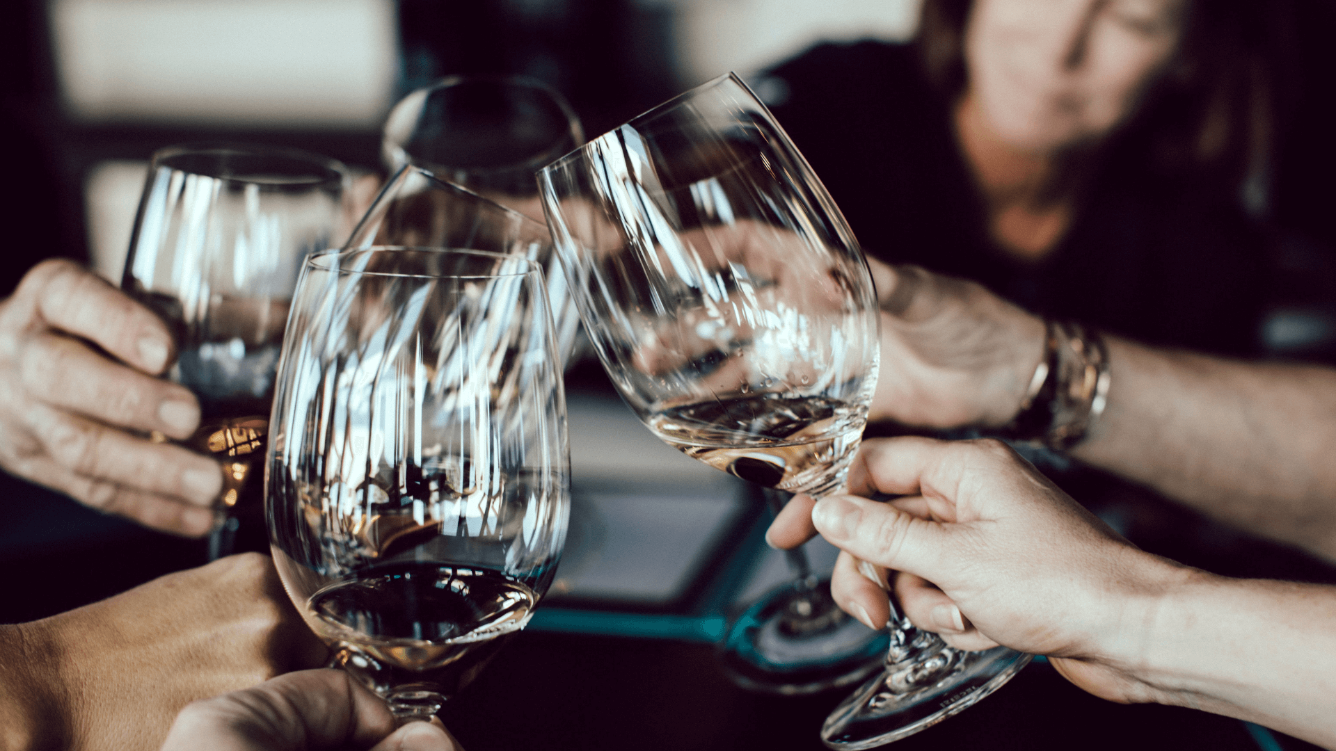 friends-clinking-wine-glasses