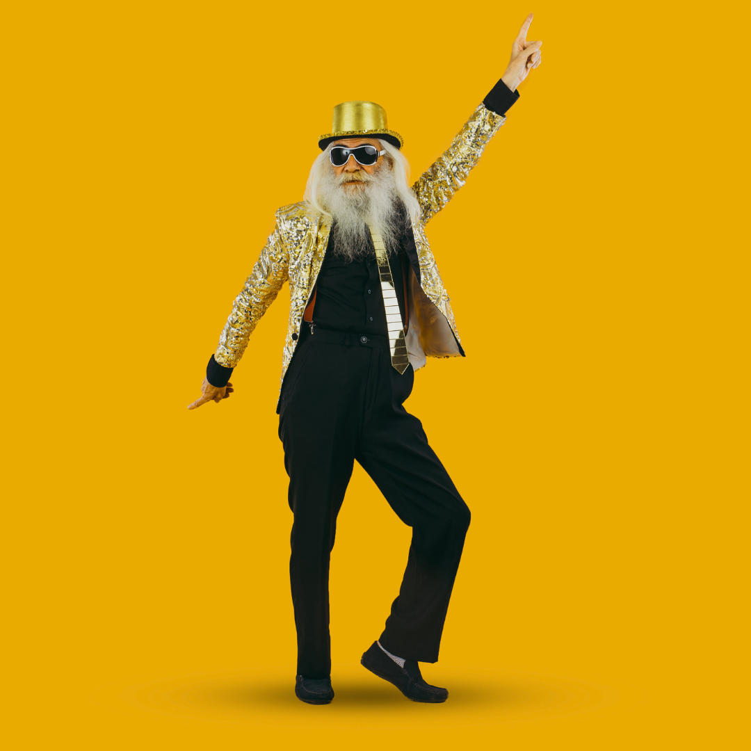 older man dancing dressed up for party