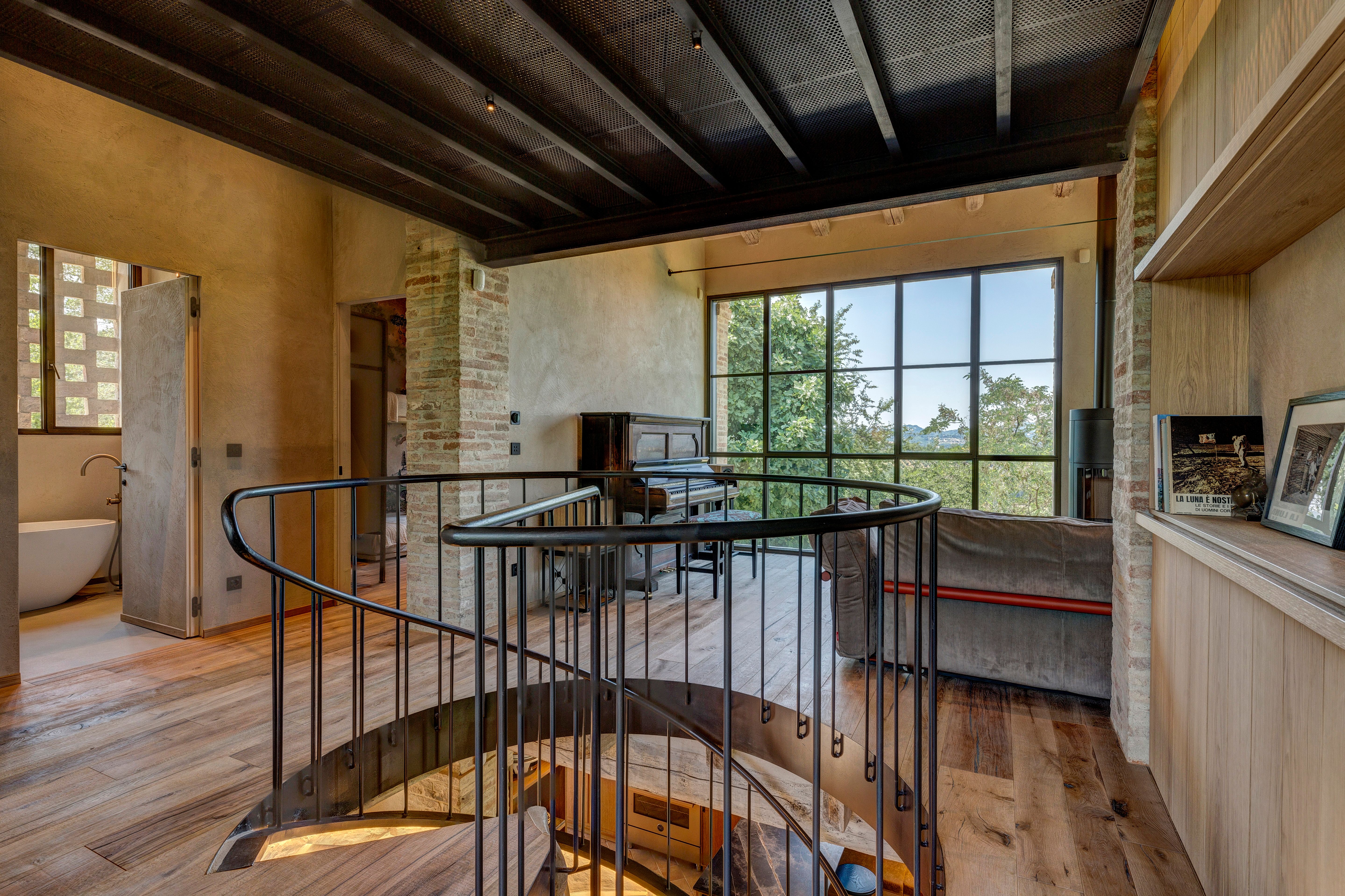 The upstairs landing, the bathroom door beyond