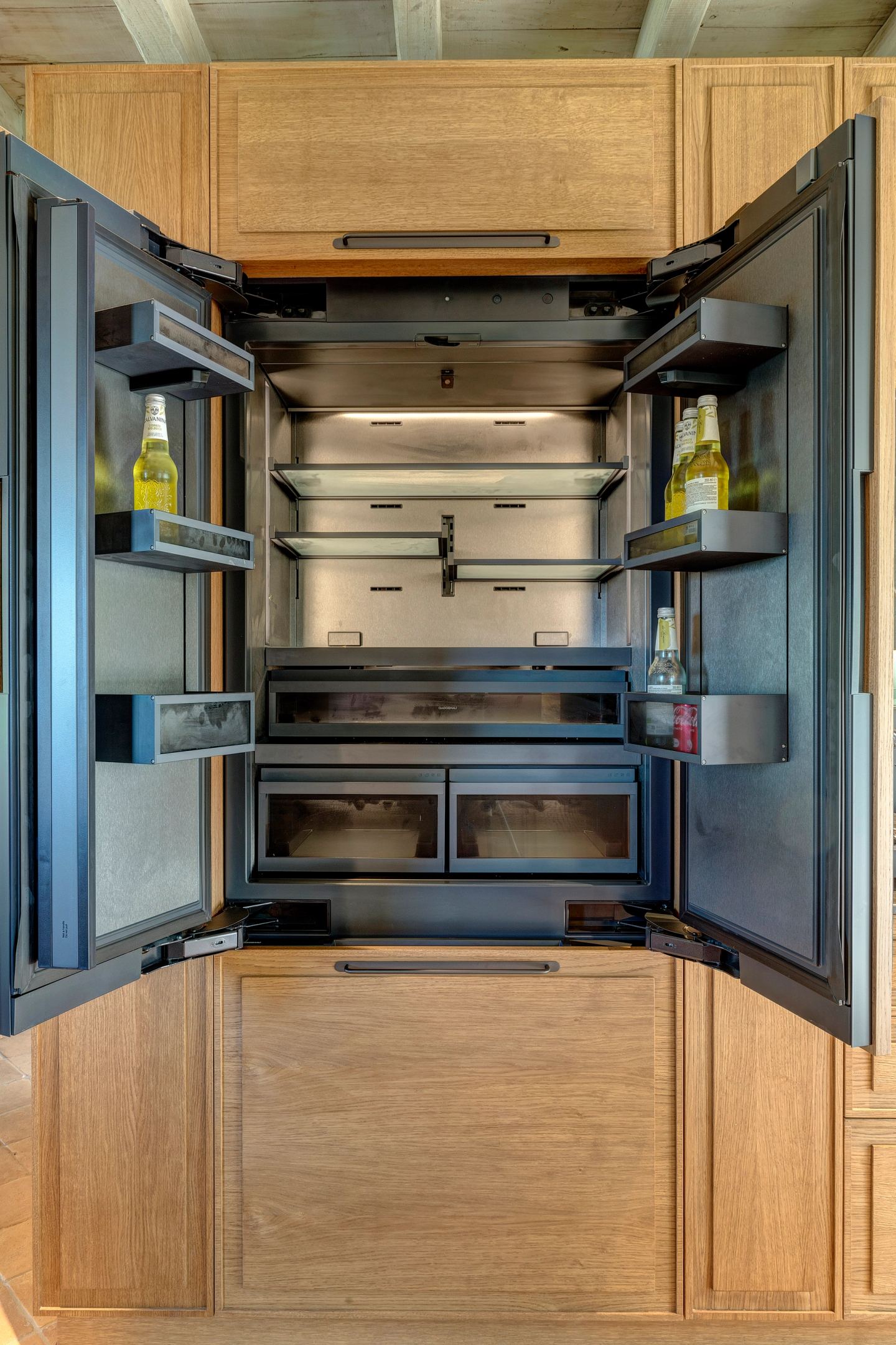 Refrigerator and freezer open and lit