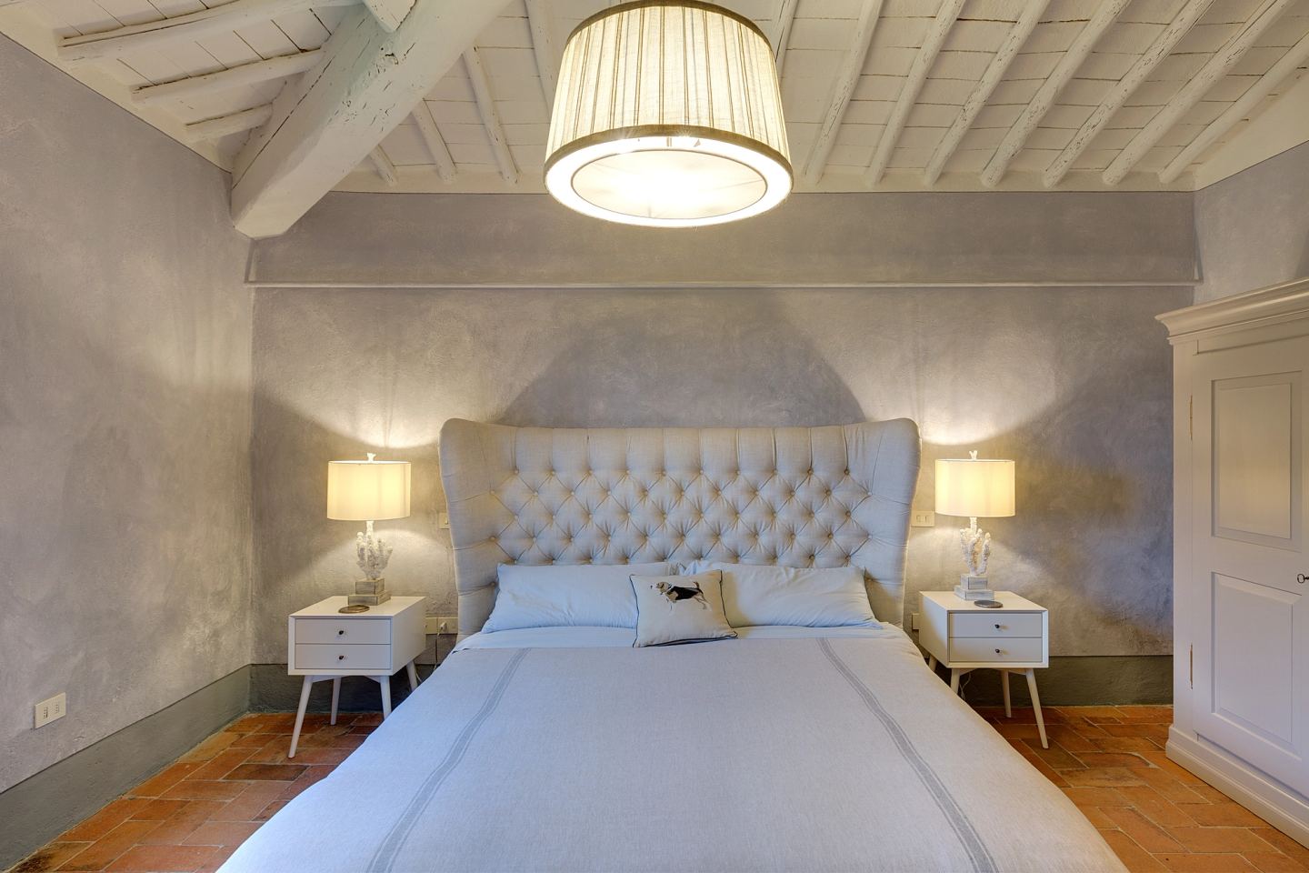 Both lamps lit at the bedside