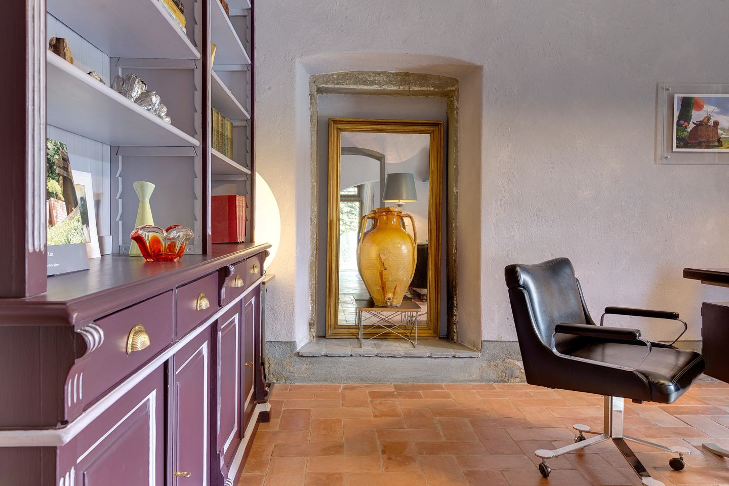 The desk chair turned towards the mirror