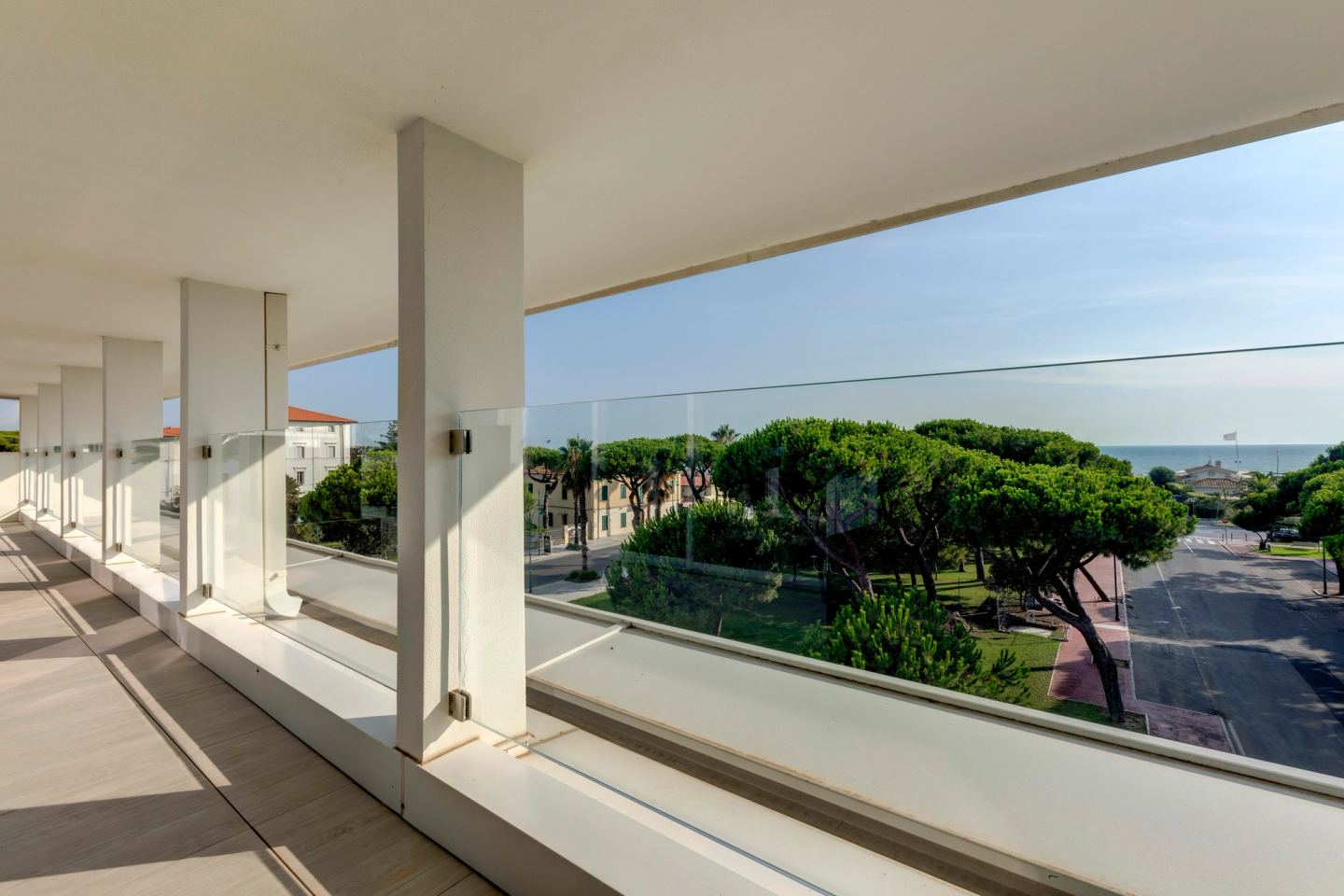 The loggia running to the far column