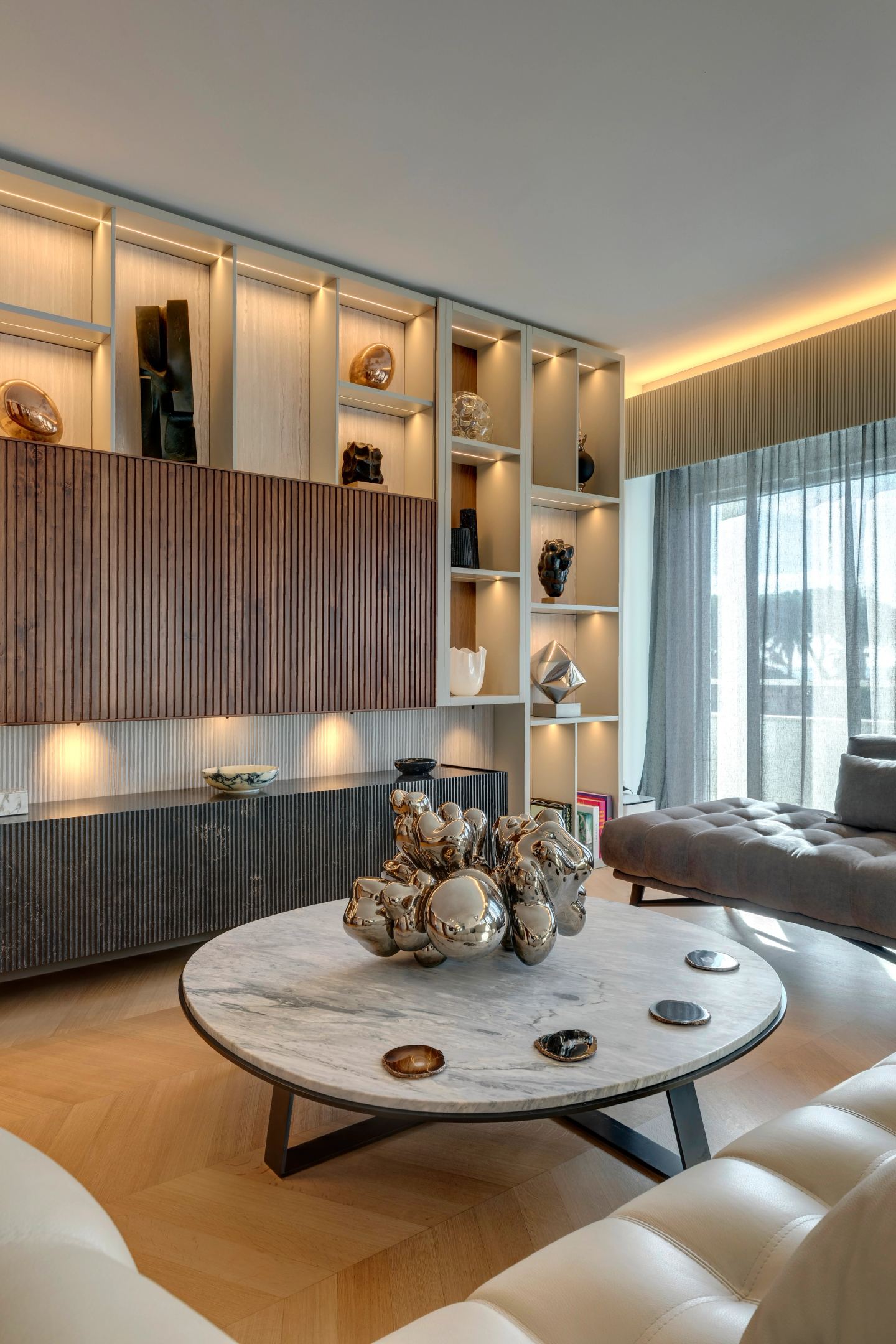 Marble coffee table against the joinery wall, portrait view