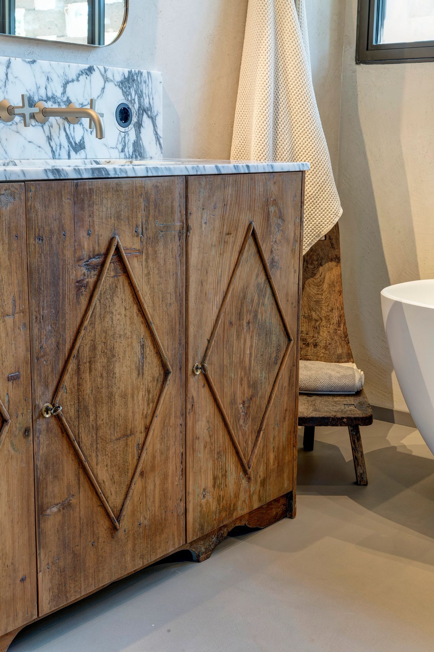 The vanity doors and the bath beside them