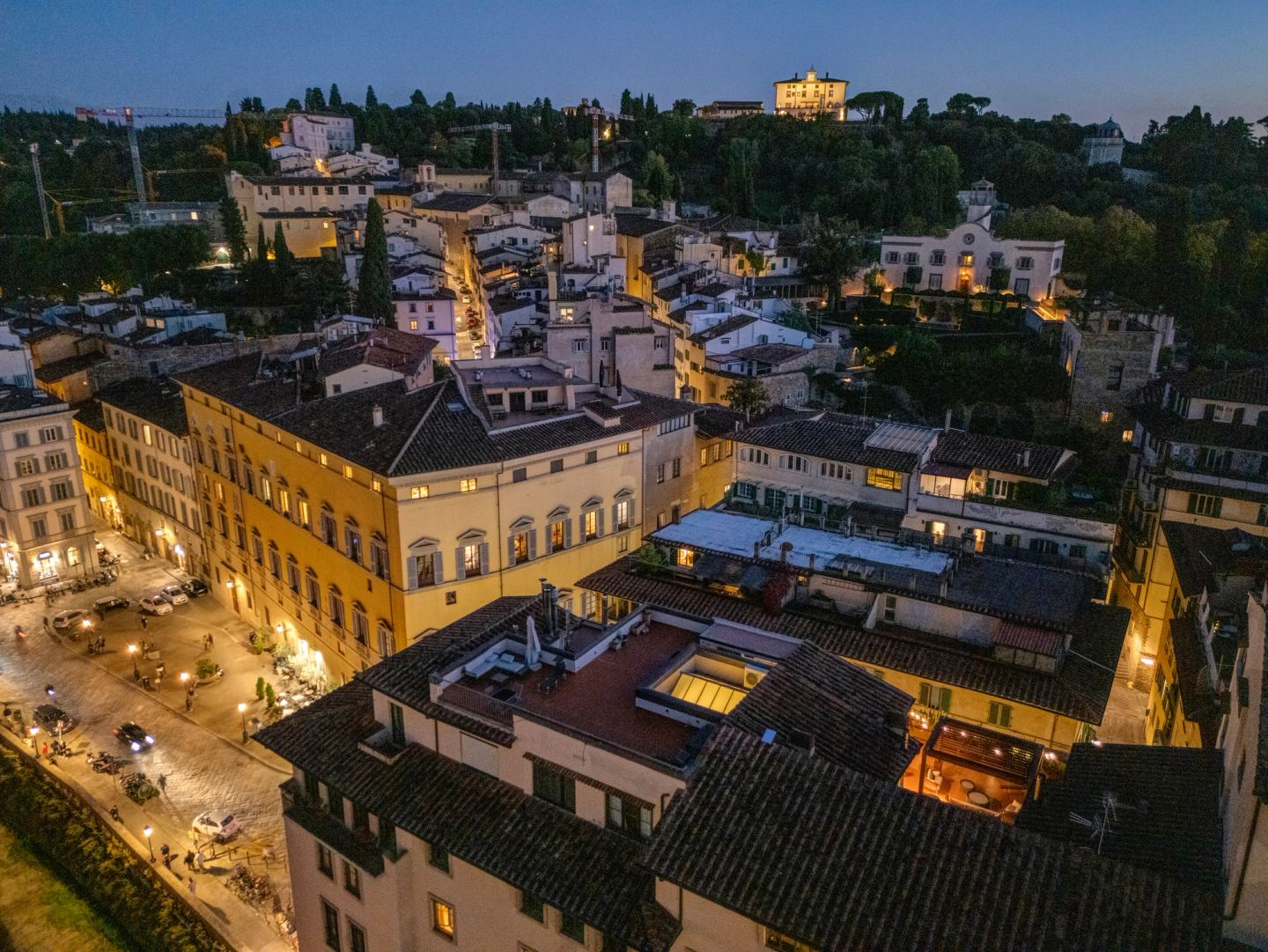 The quarter at blue hour, streets running to the river