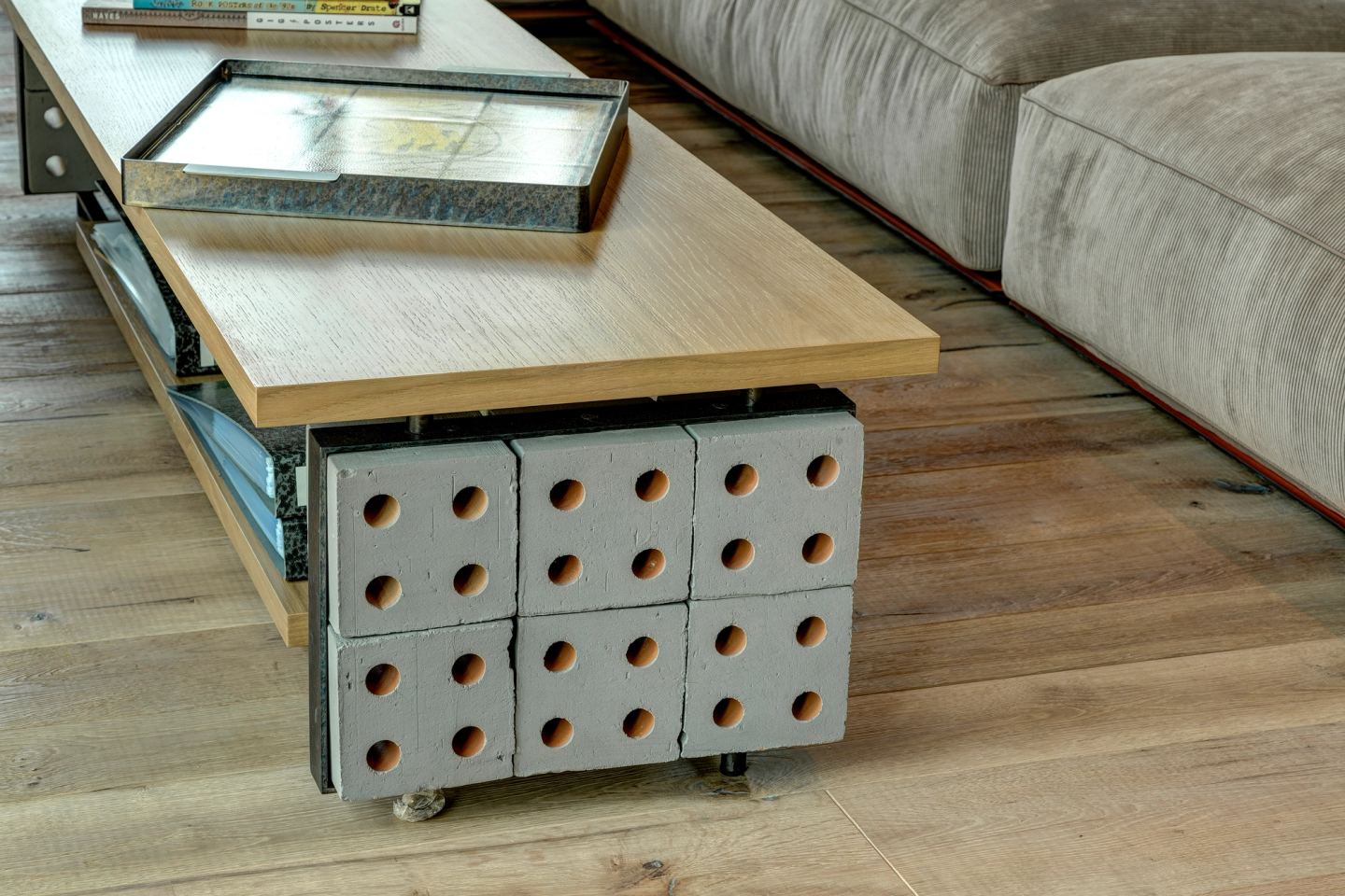 The low table on its perforated base