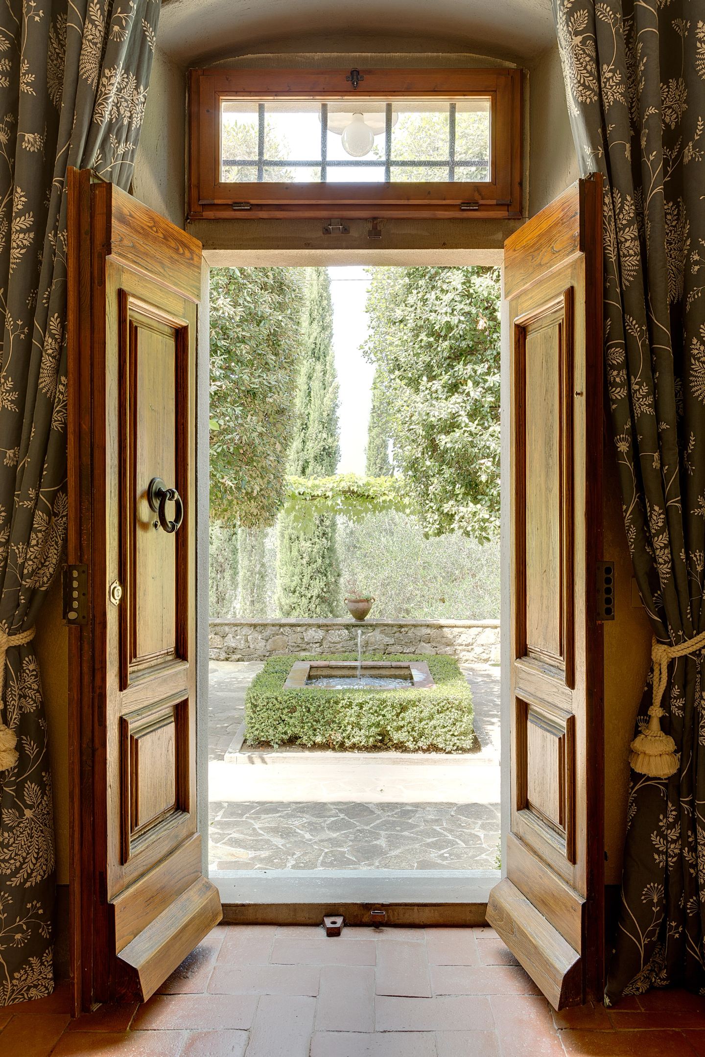The doors thrown open onto the forecourt