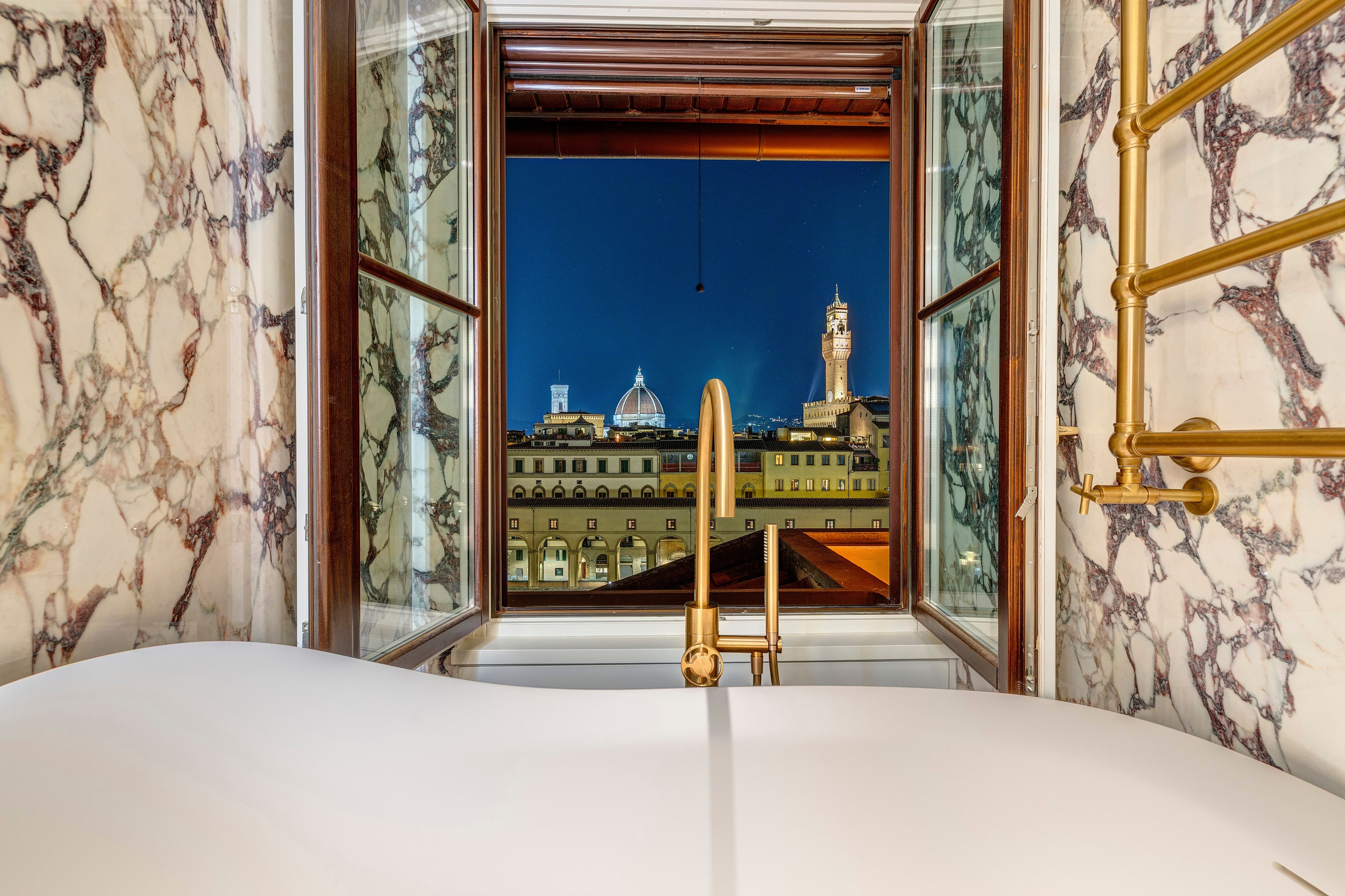 The window above the bath at blue hour, Palazzo Vecchio lit