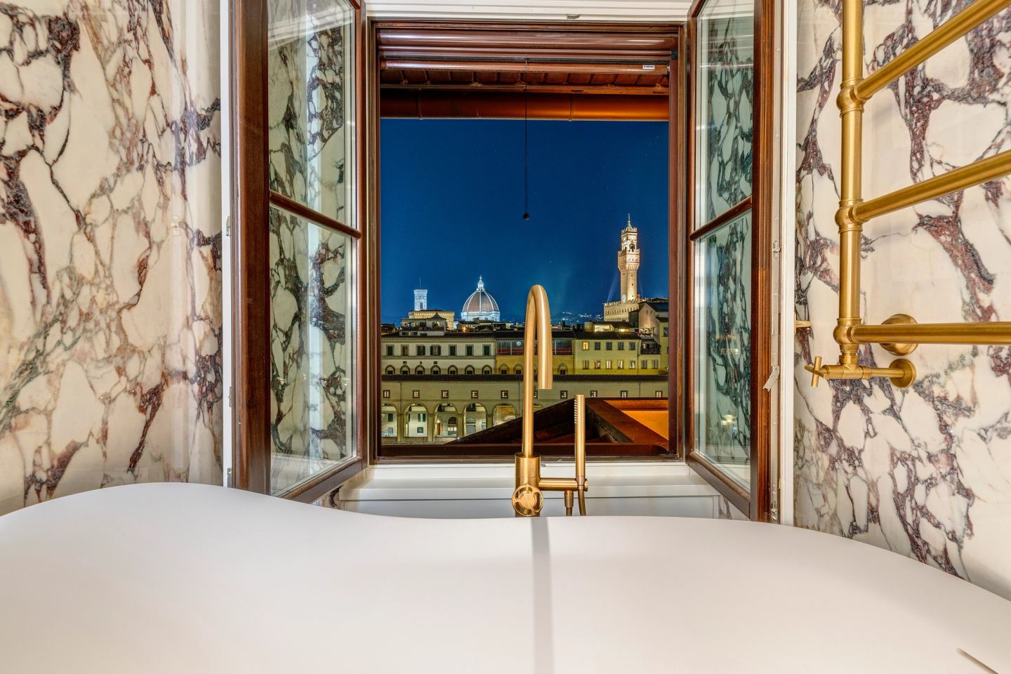 The window above the bath at blue hour, Palazzo Vecchio lit