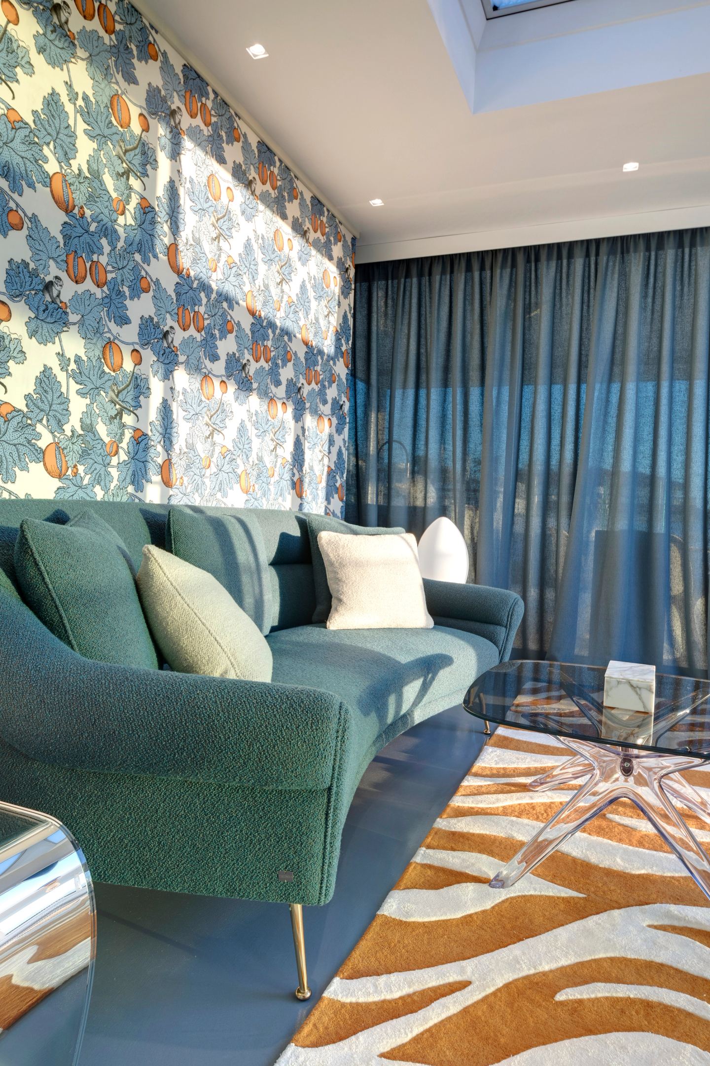 The seating group on the rug, portrait view