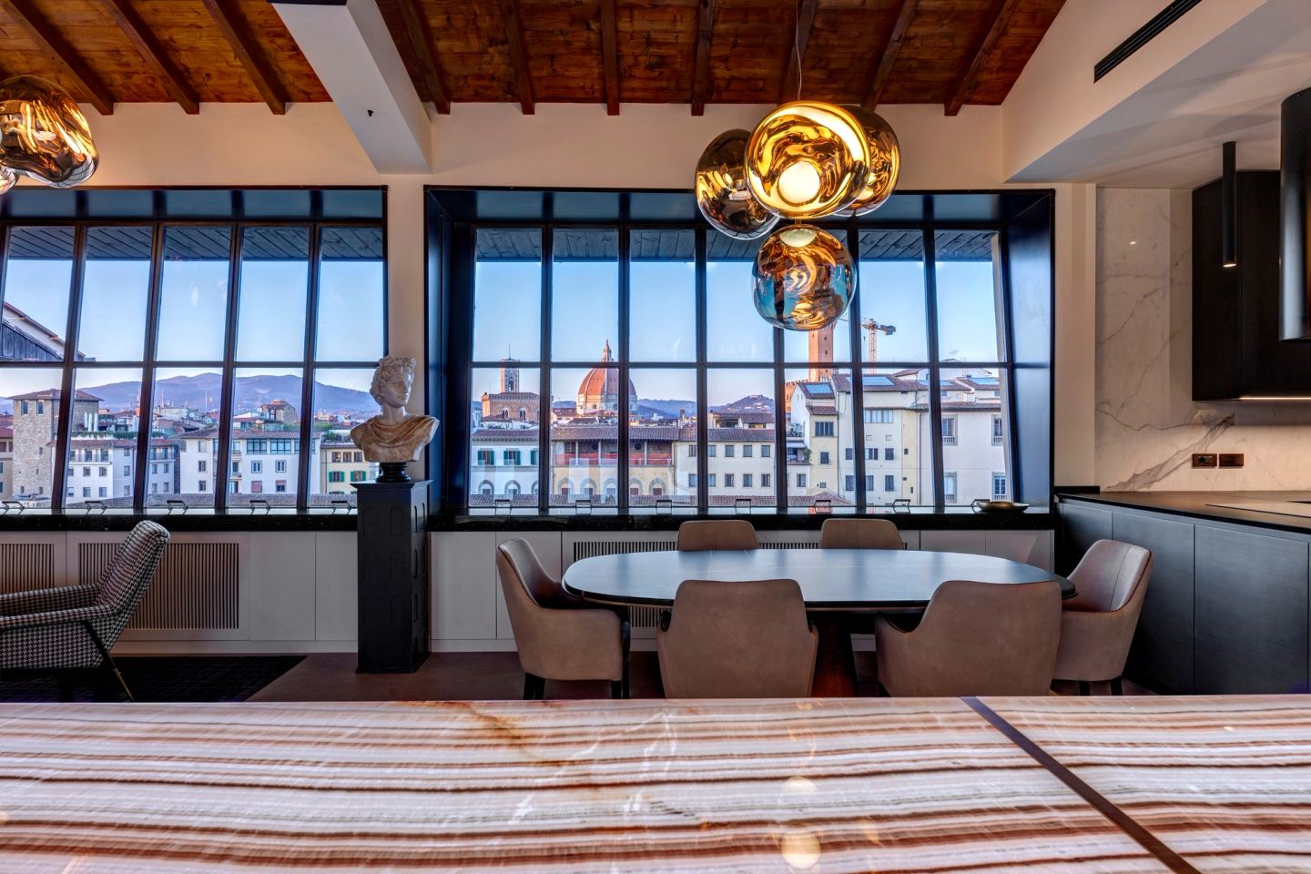 Dining and counter in one view, the roof beams above