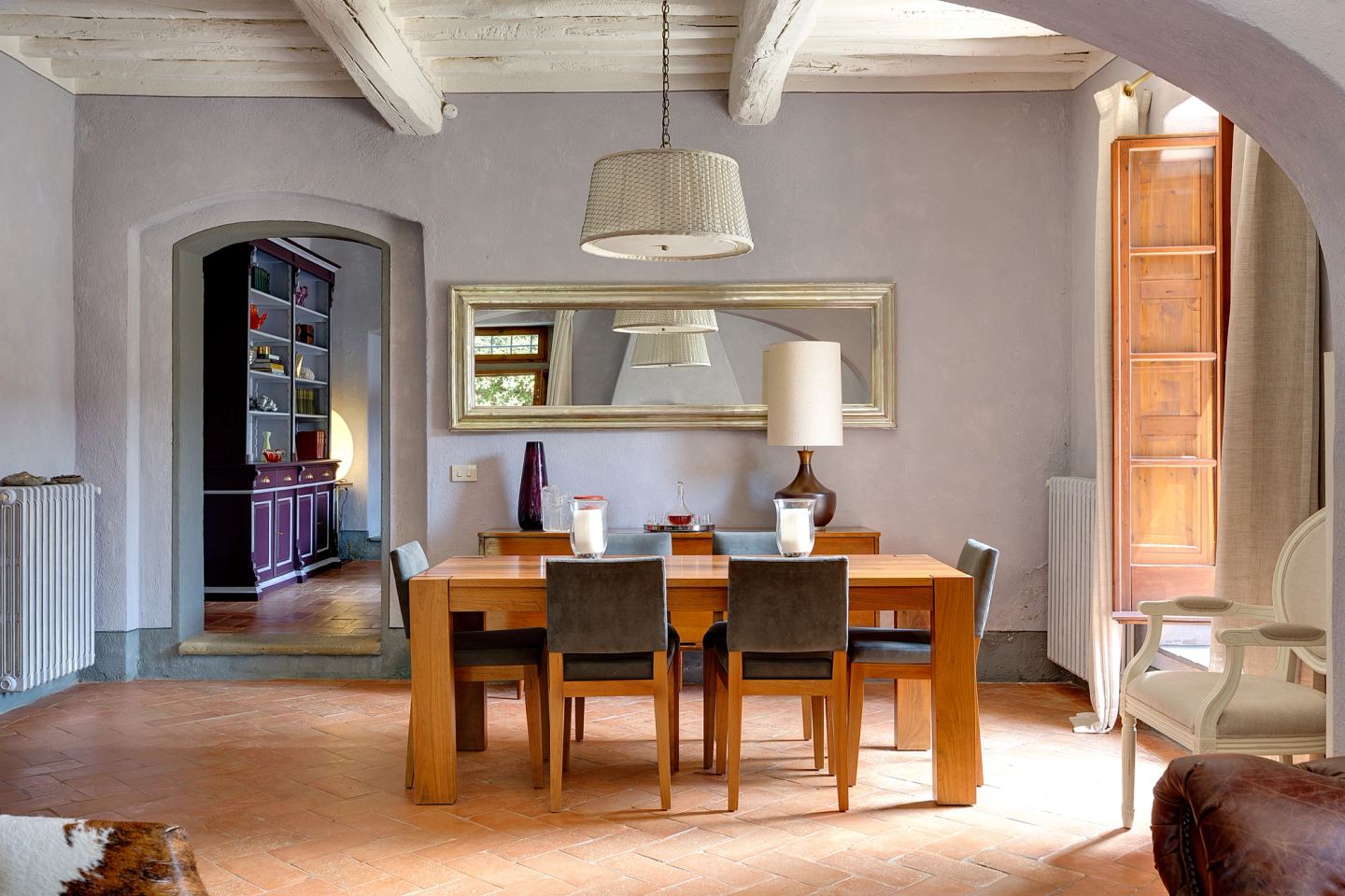 Lamps hung low over the dining table