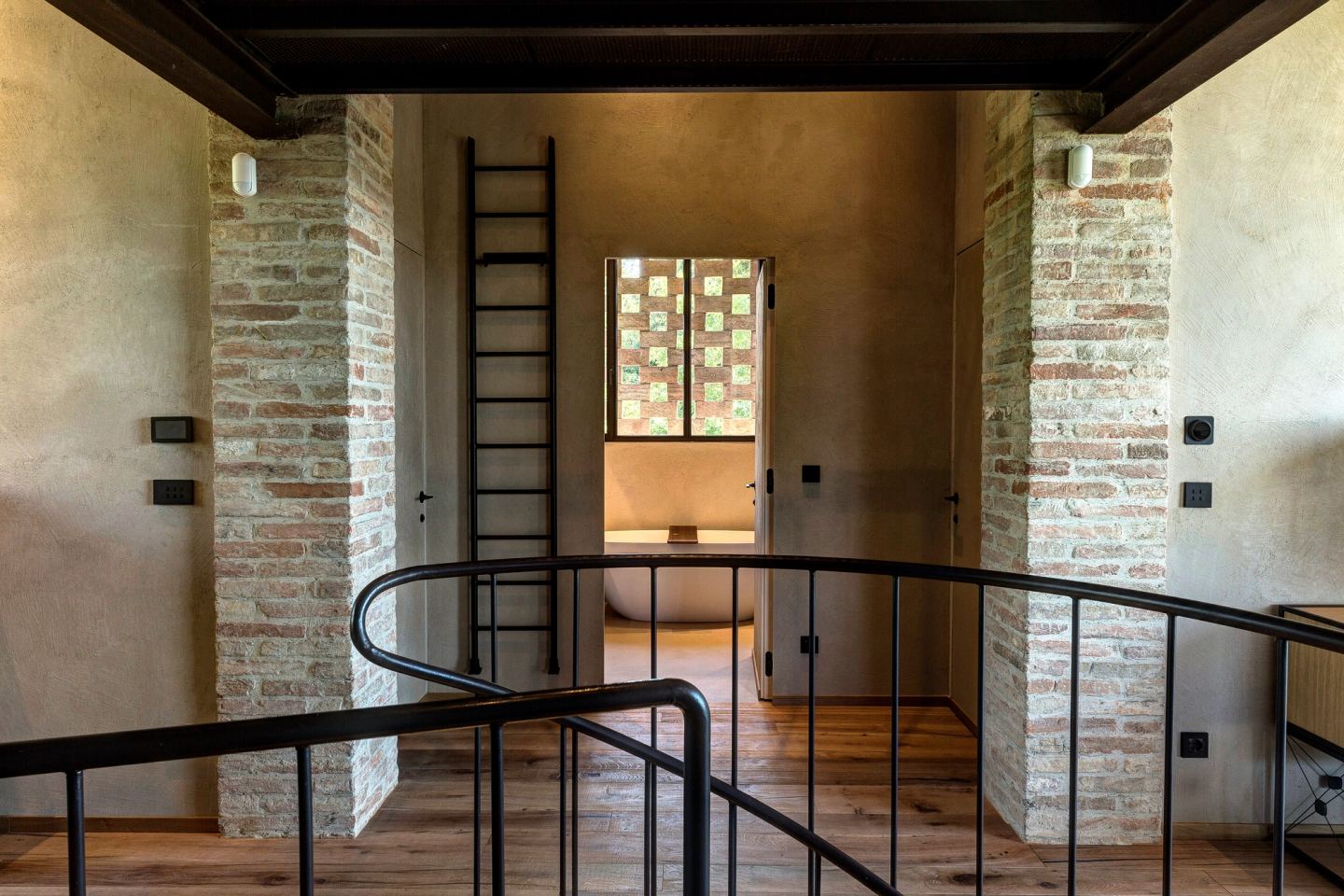 The landing and the ladder to the mezzanine