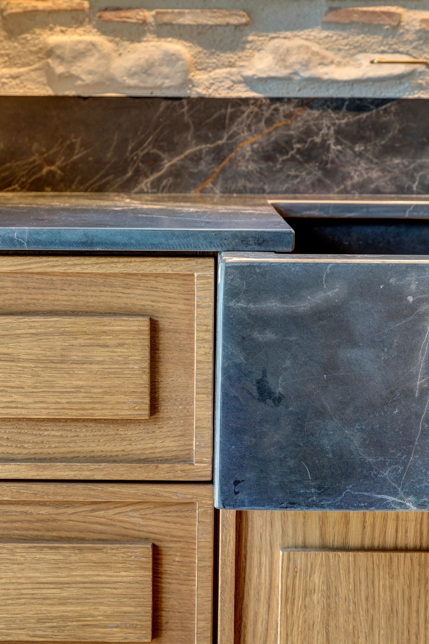 Marble over oak, the drawer beneath