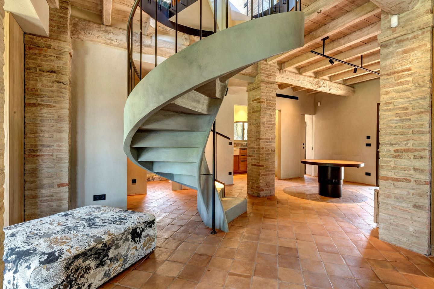 The stair and the bench, the floor opening beyond