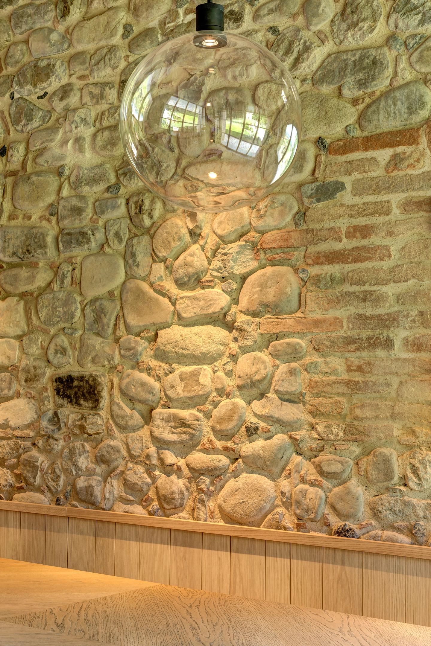 A glass globe hung against the wall