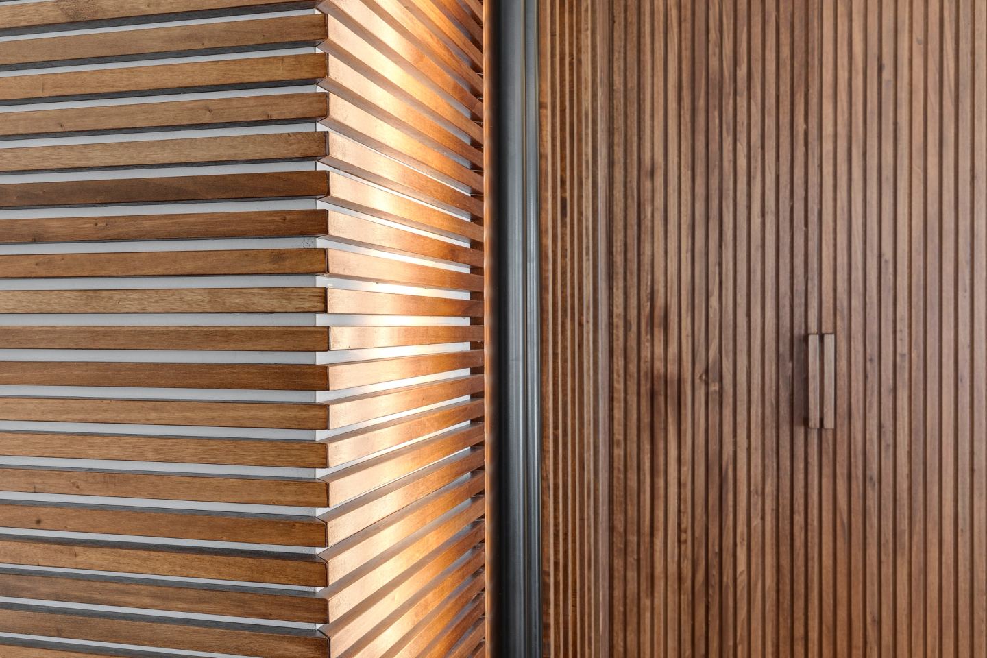 Ribbed walnut doors with recessed handles