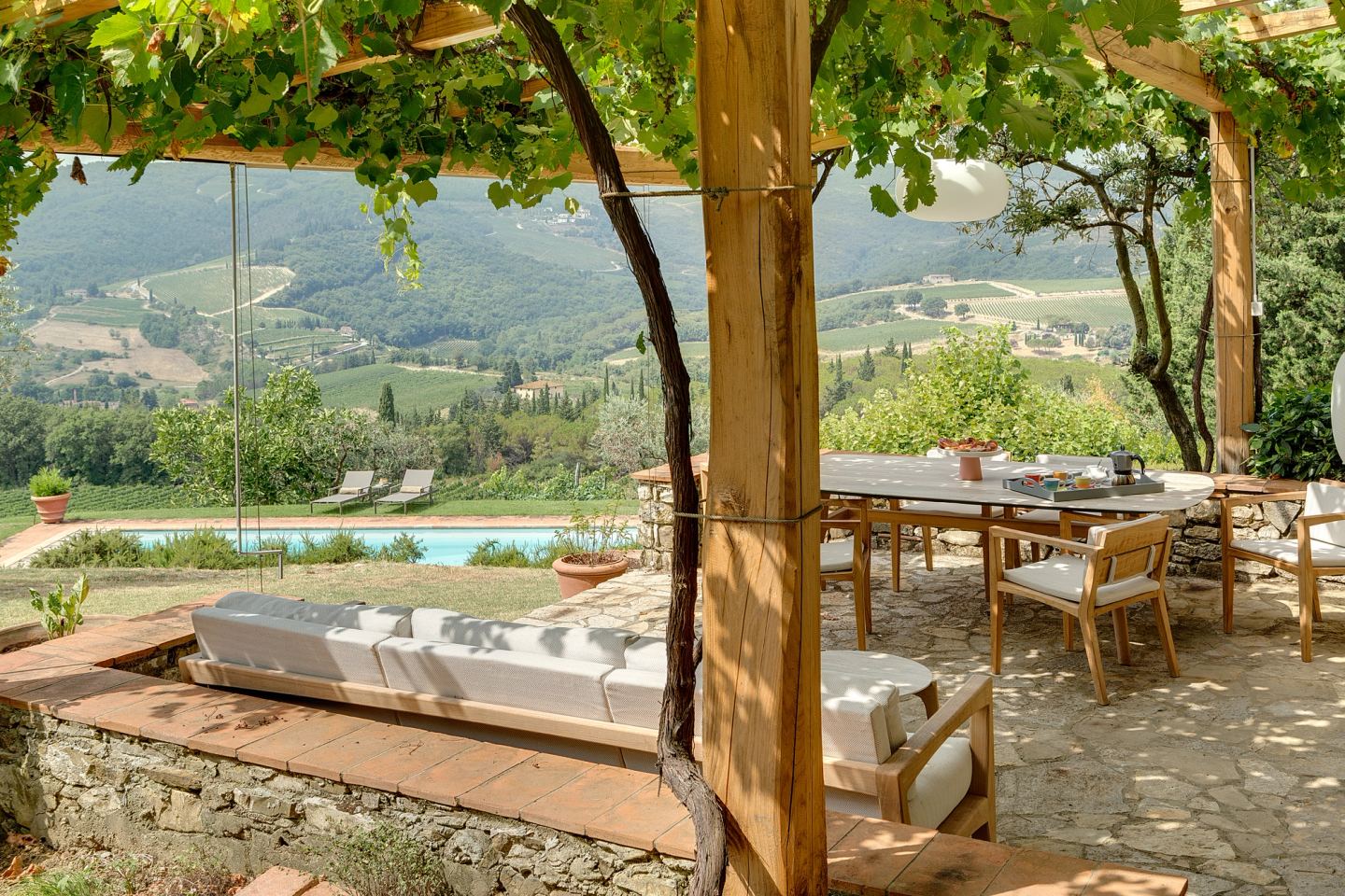 The daybed with the pool behind it