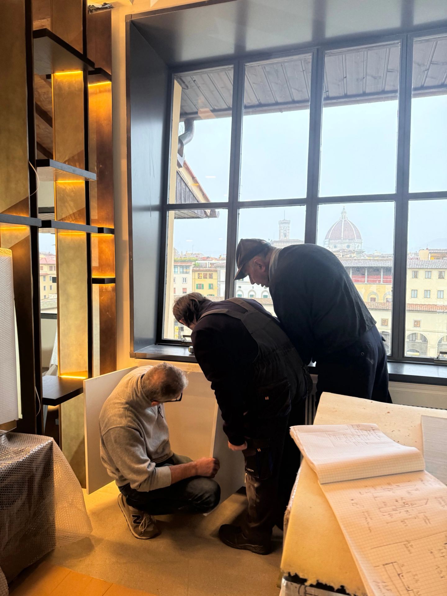 Fitting the last pieces by the window