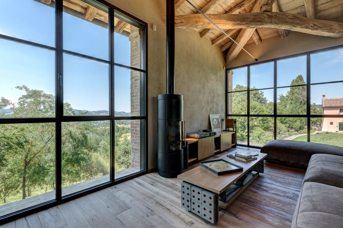 Steel windows, the stove, the hills beyond