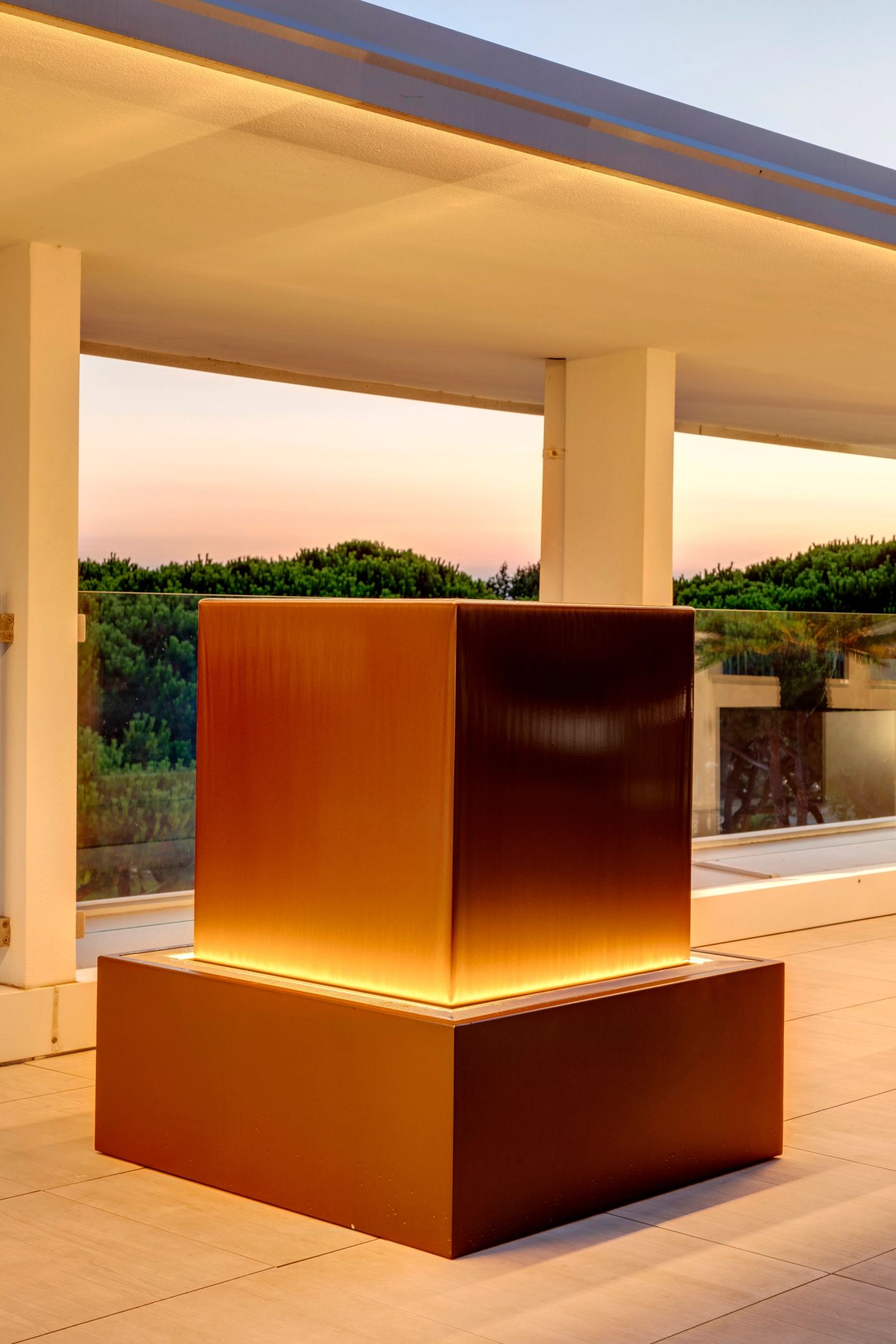 The water column uplit from its basin after sunset