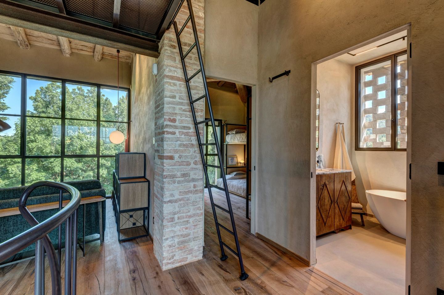 The landing, the ladder and the bathroom door