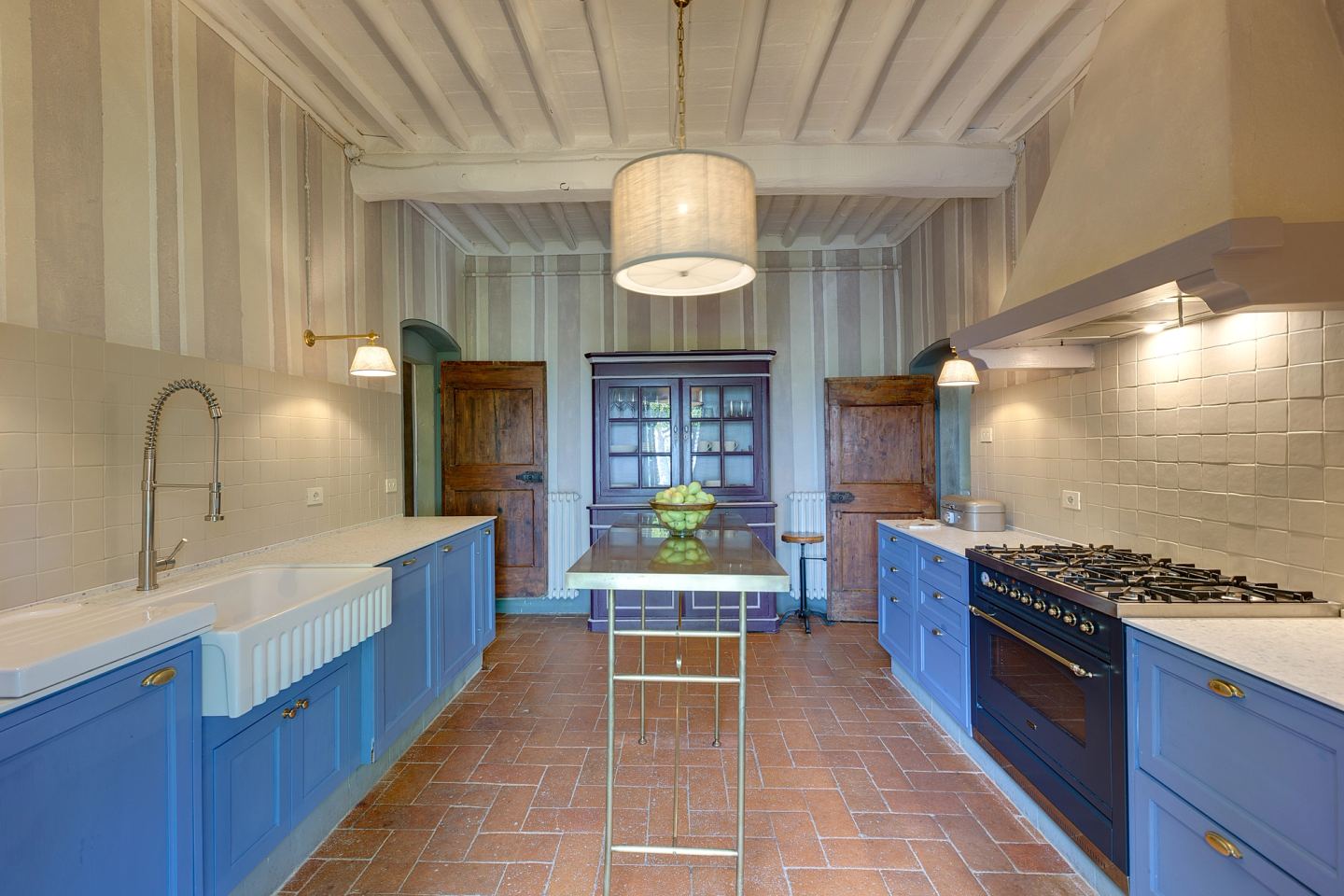 The English sink and the blue run under the vaulted ceiling