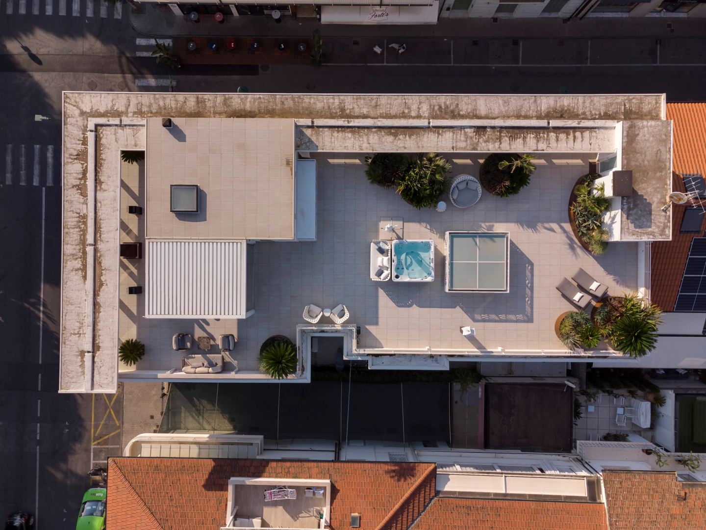 The terrace from above: pergola, spa, planters