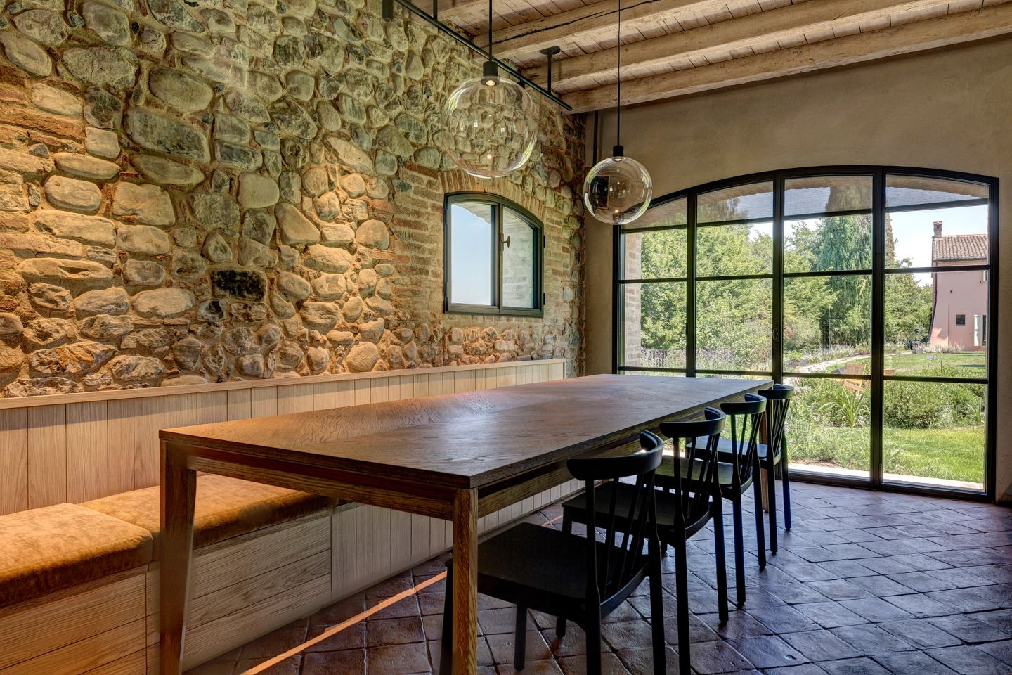 The table by the window, the garden outside