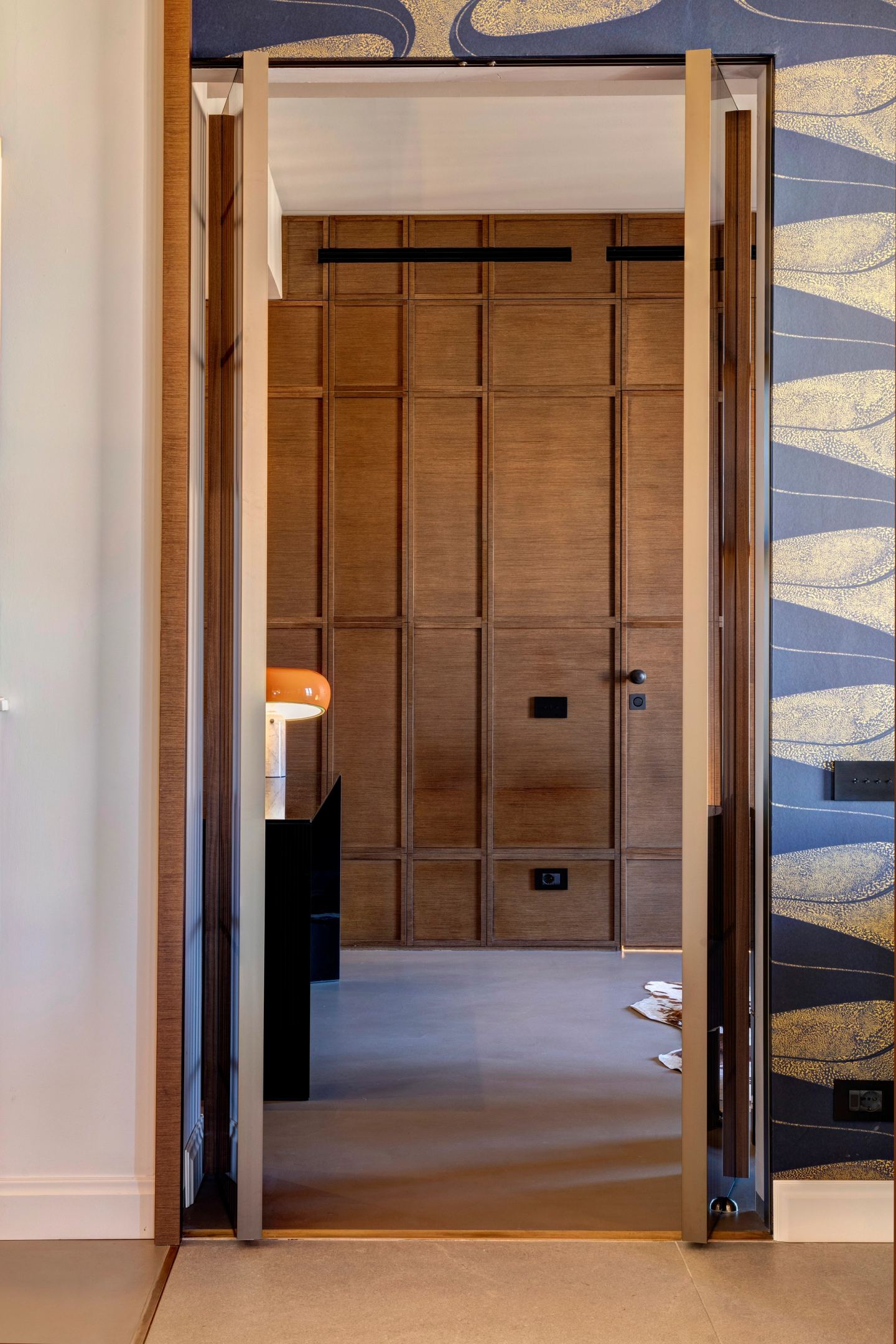The slatted door from the corridor side