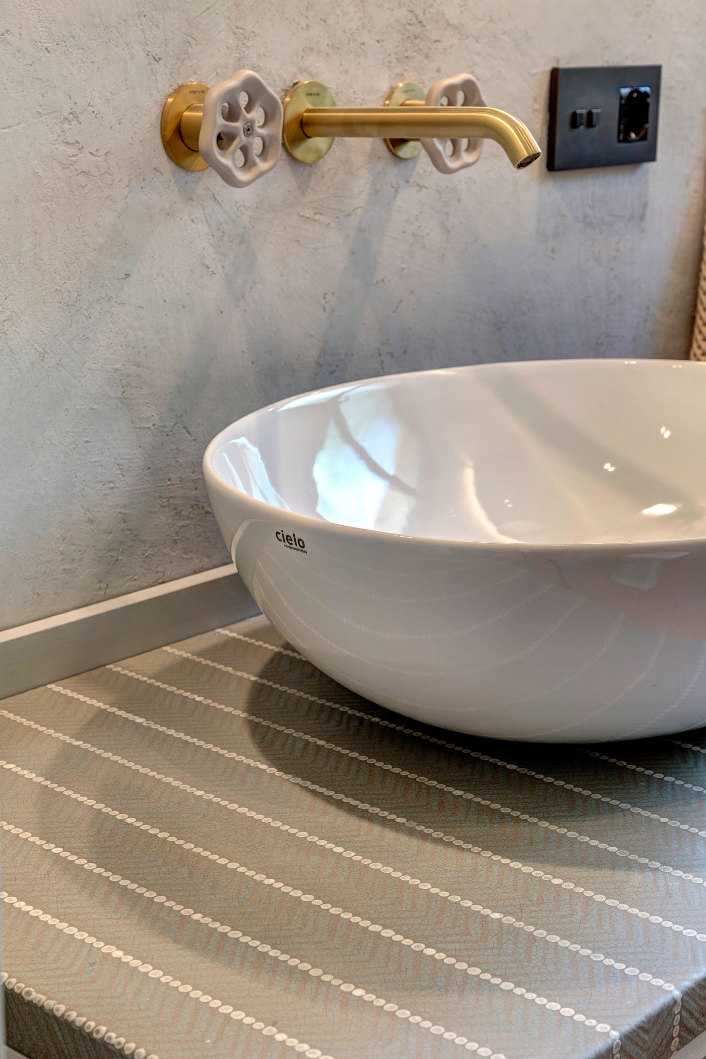 The basin from above, taps on the plaster