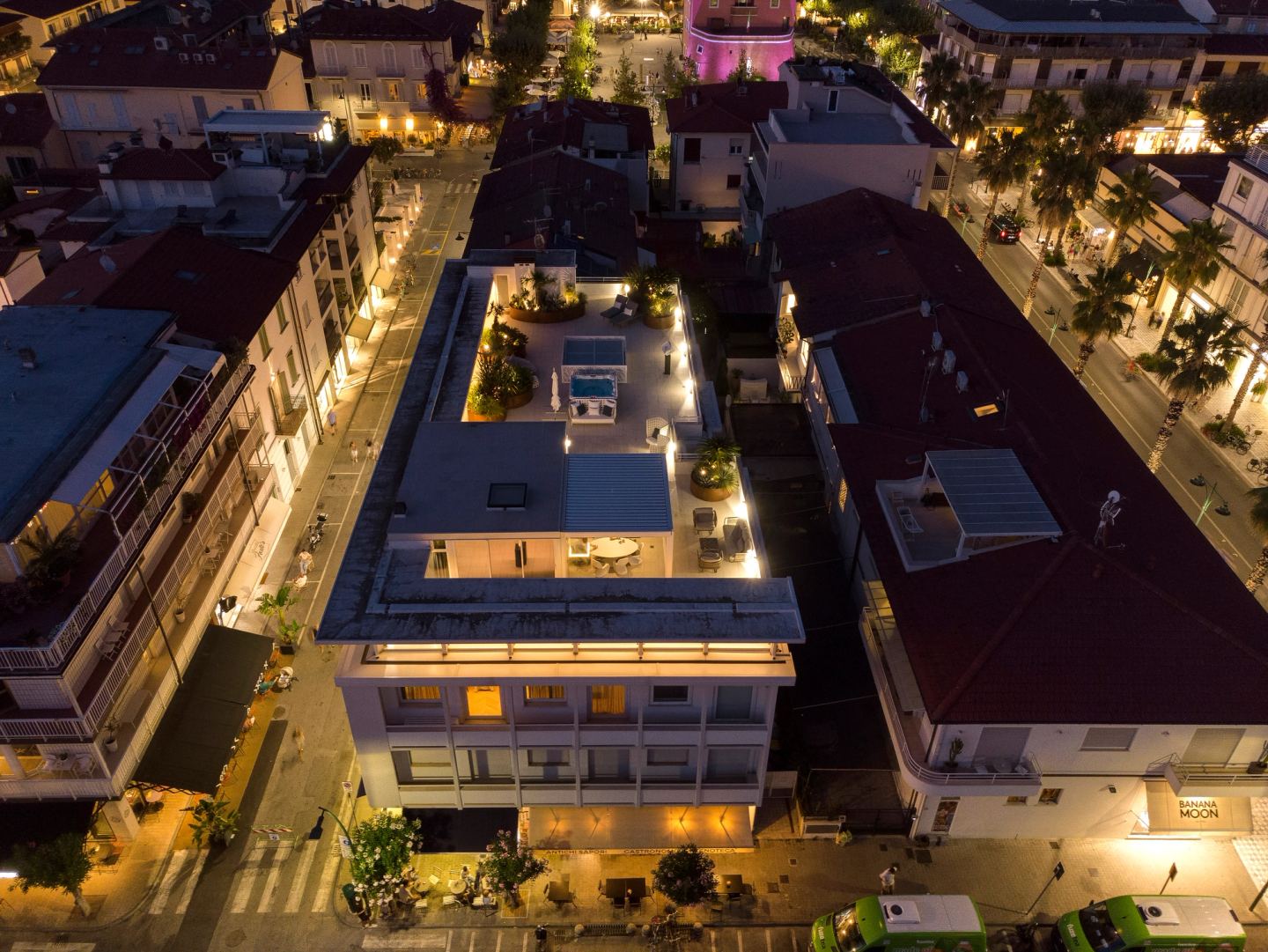 The building and the lit street at night
