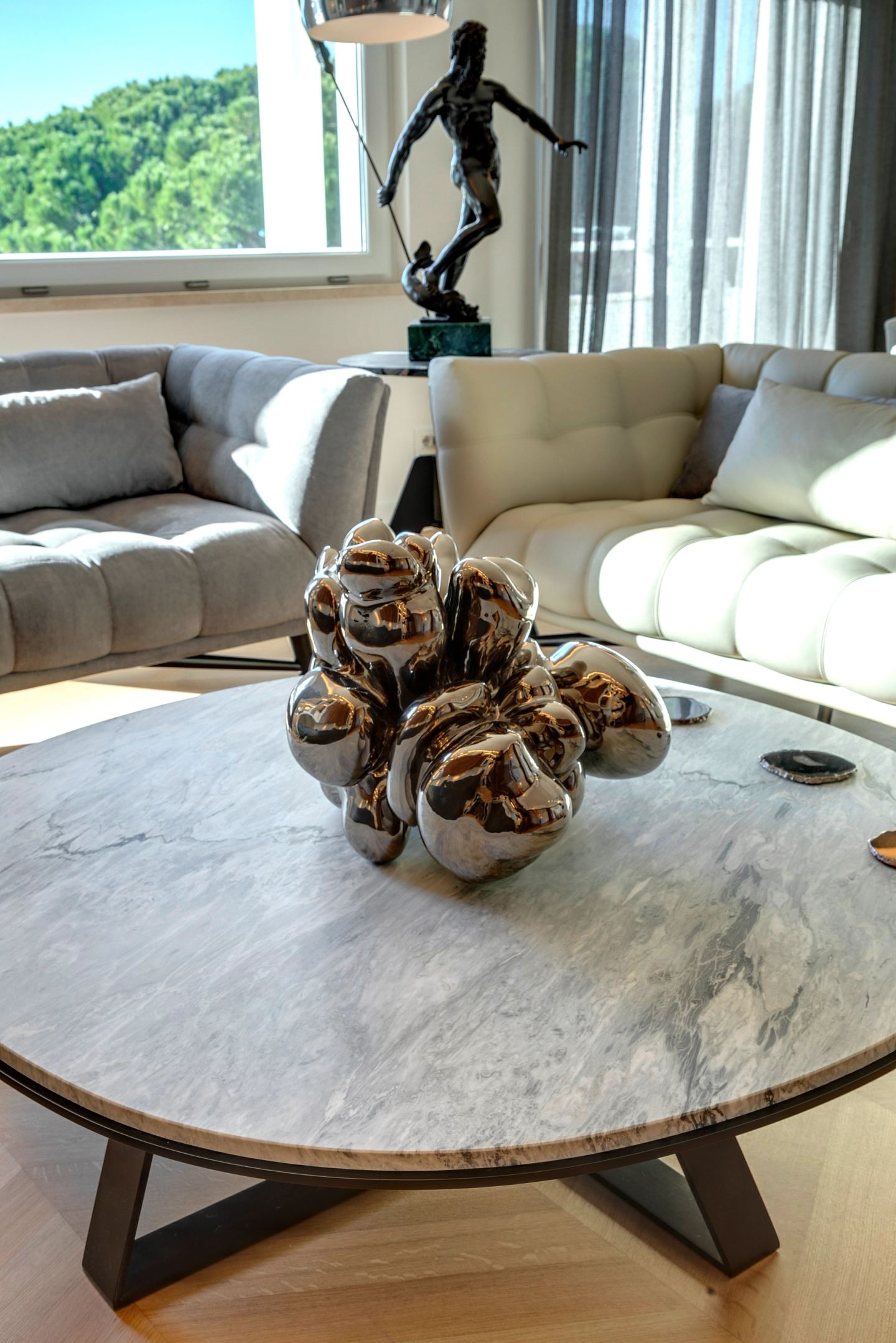 Marble coffee table with sculptural centrepiece, close